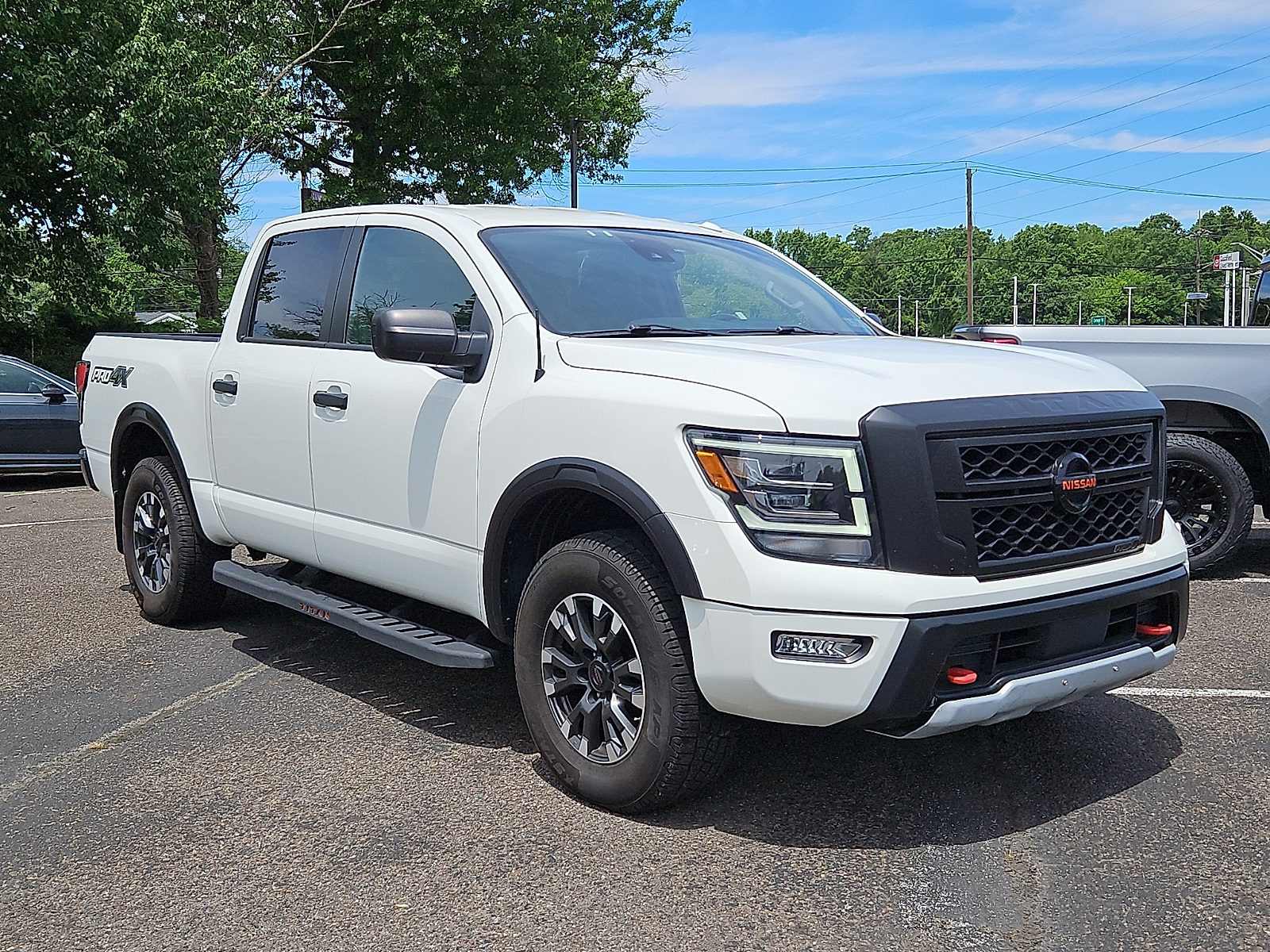 White 2021 Nissan Titan Pickup Truck Four-Wheel Drive 9-Speed Automatic