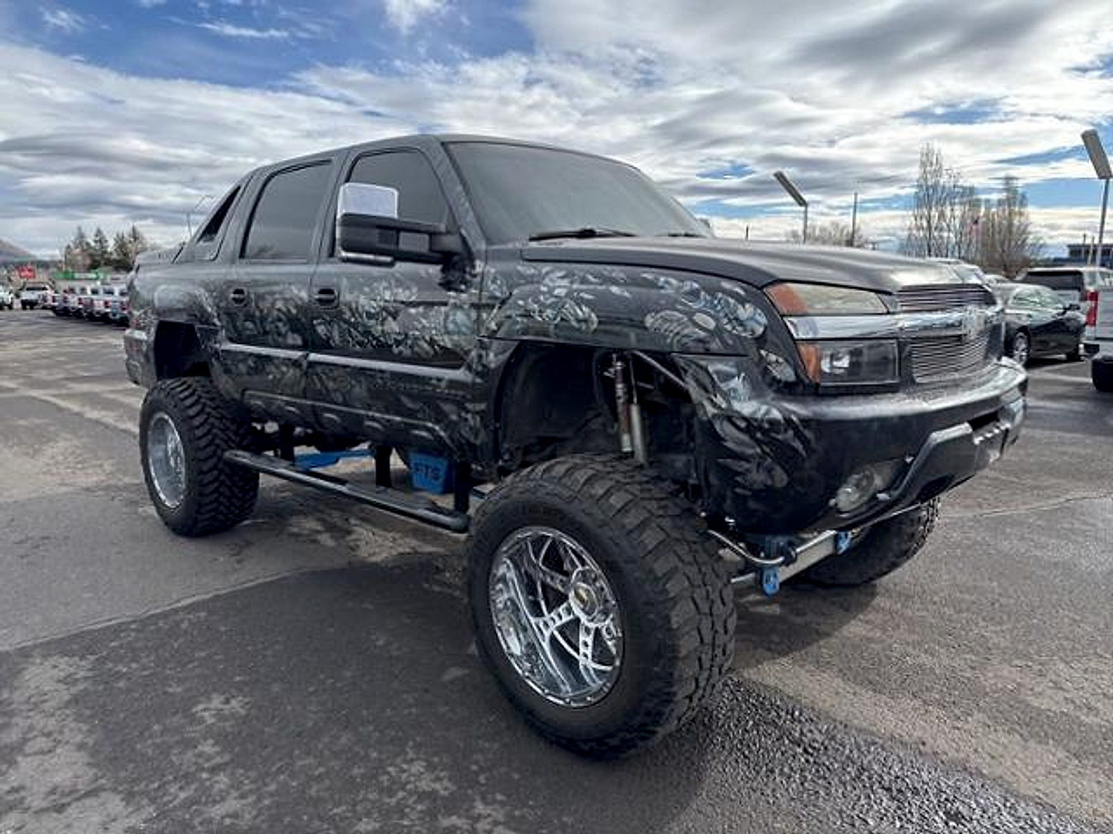Sunset Orange Metallic 2002 Chevrolet Avalanche Pickup Truck Four-Wheel Drive 4-Speed Automatic Overdrive