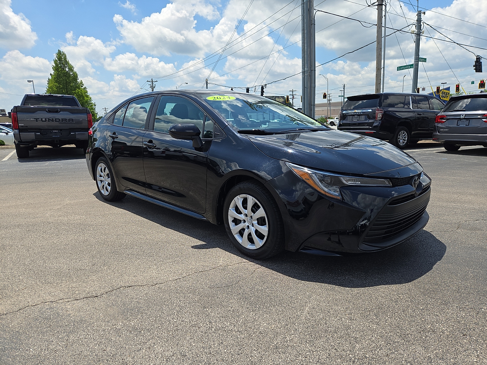 Midnight Black Metallic - 218 2024 Toyota Corolla LE FWD Sedan Front-Wheel Drive Automatic