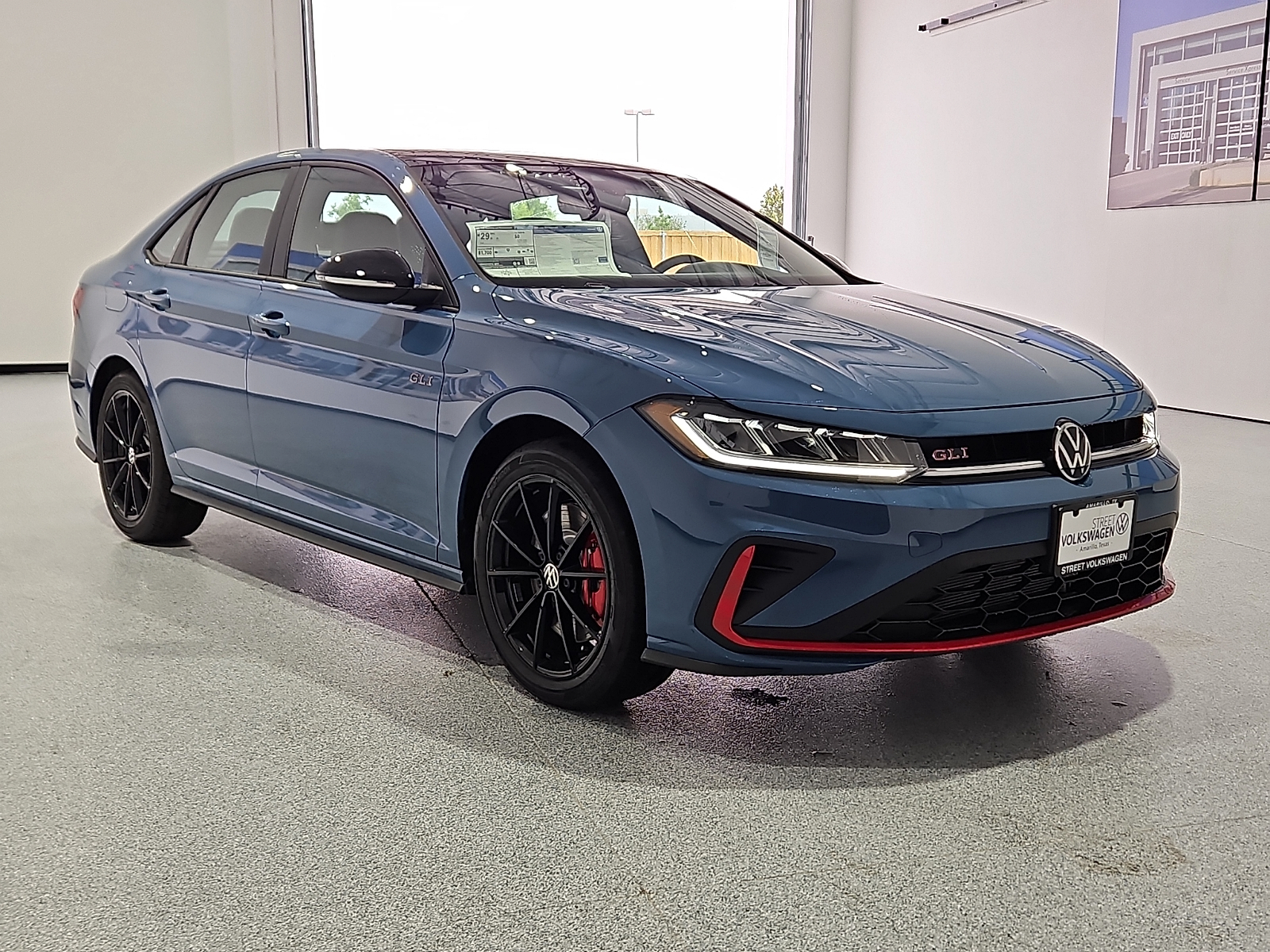 2026 Volkswagen Jetta GLI Autobahn Monterey Blue Pearl w/Deep Black Roof at Street VW of Amarillo