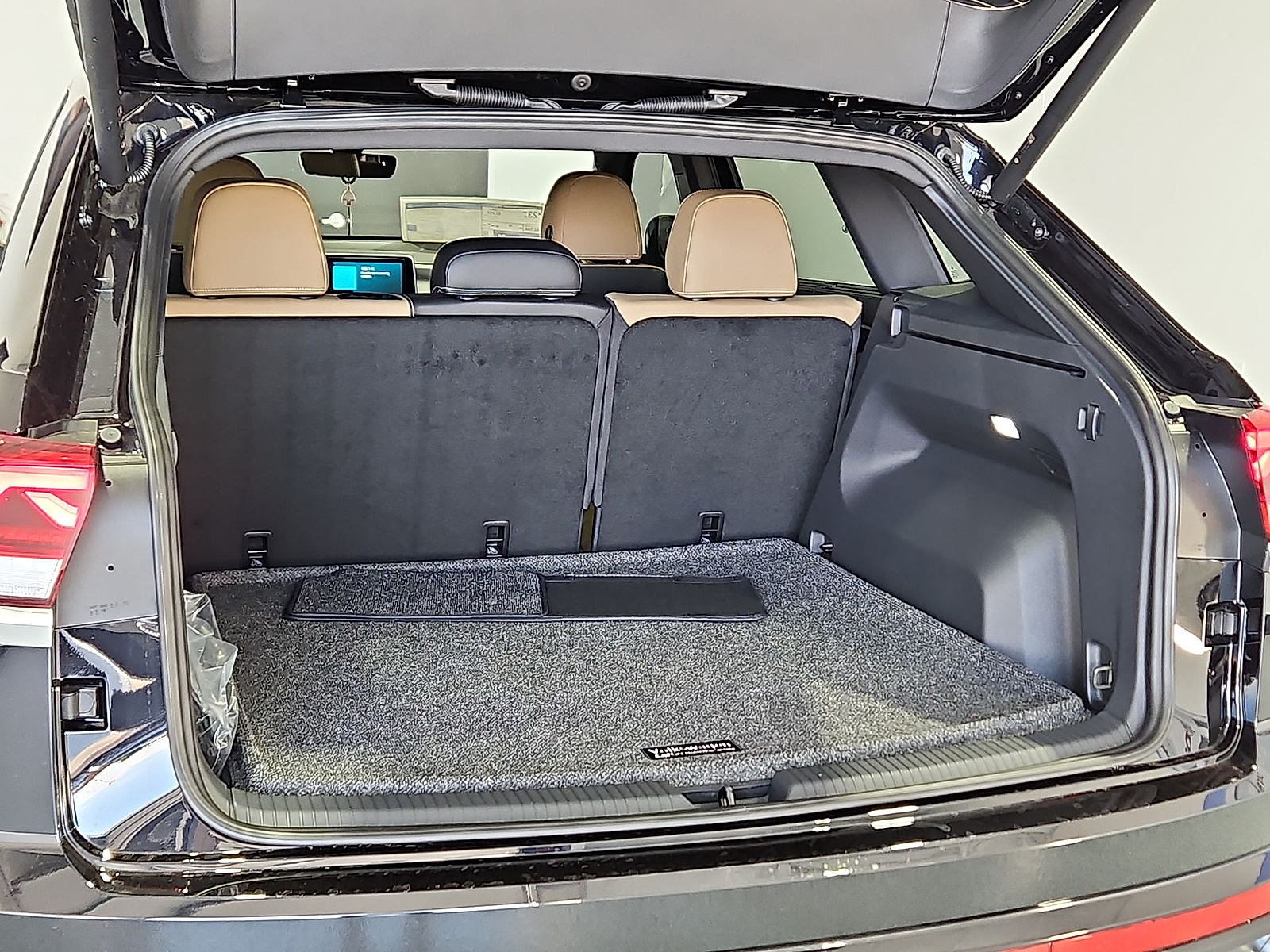 2026 Volkswagen Atlas Cross Sport SE with Technology Deep Black Pearl at Street VW of Amarillo