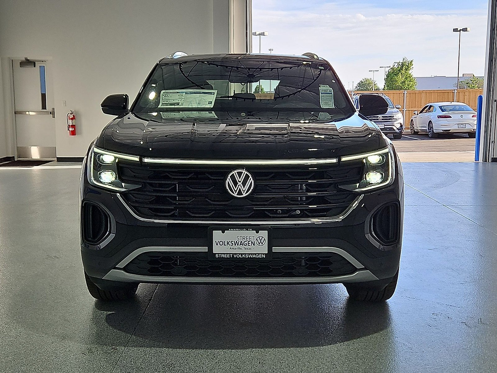 2026 Volkswagen Atlas Cross Sport SE with Technology Deep Black Pearl at Street VW of Amarillo