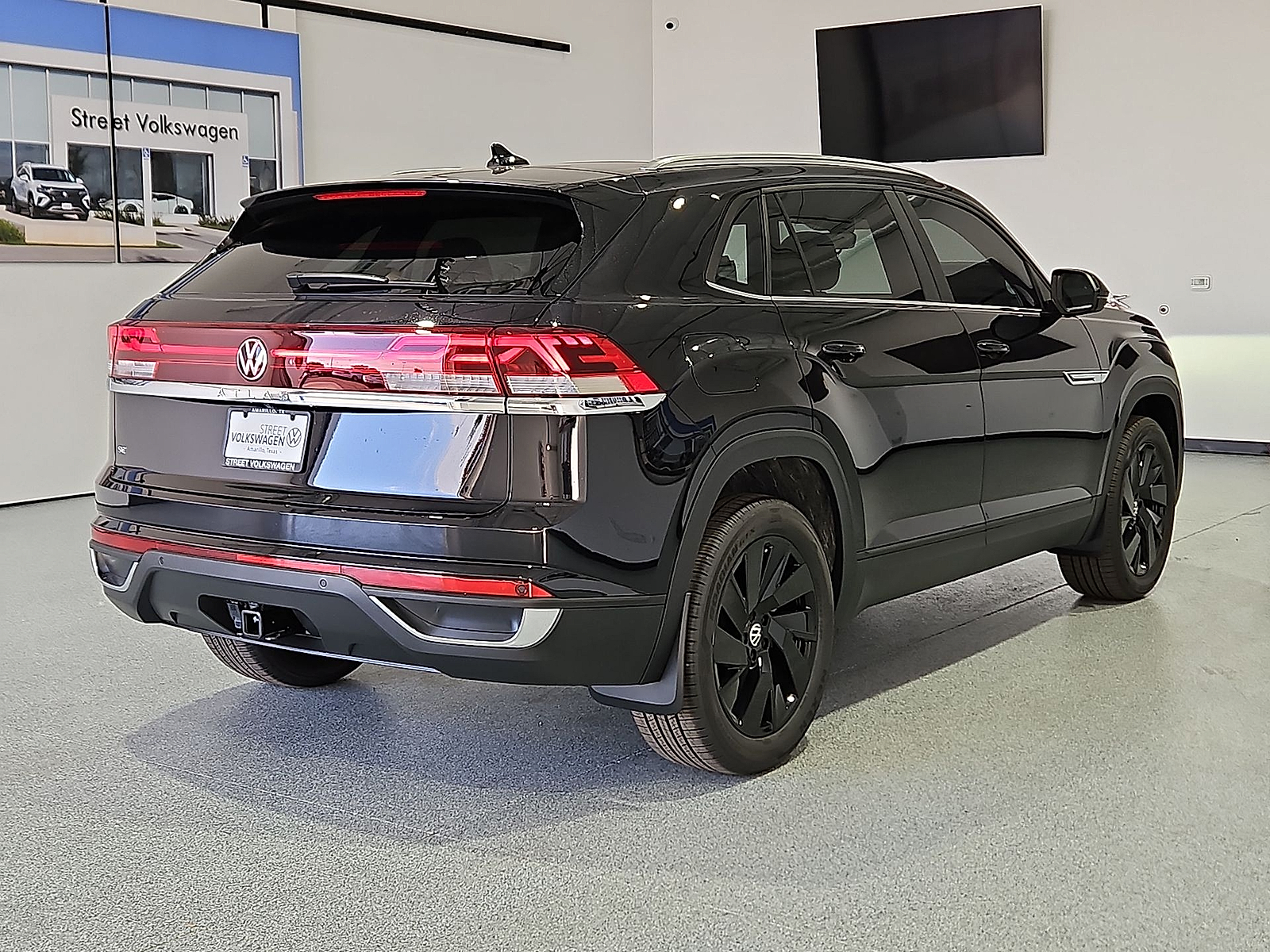 2026 Volkswagen Atlas Cross Sport SE with Technology Deep Black Pearl at Street VW of Amarillo