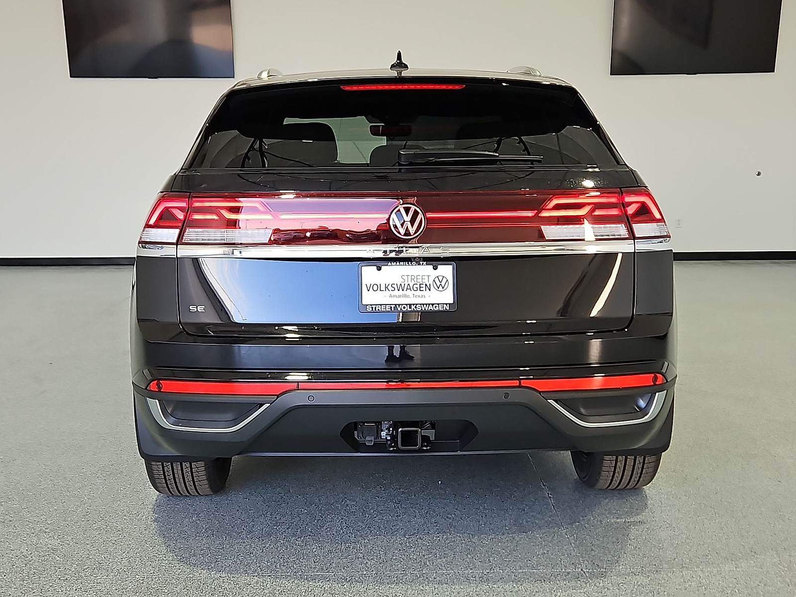 2026 Volkswagen Atlas Cross Sport SE with Technology Deep Black Pearl at Street VW of Amarillo