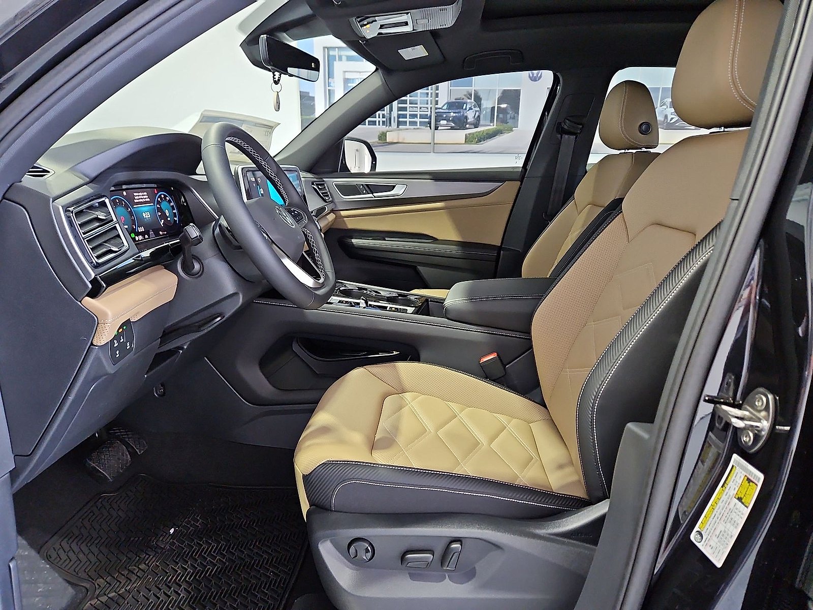 2026 Volkswagen Atlas Cross Sport SE with Technology Deep Black Pearl at Street VW of Amarillo