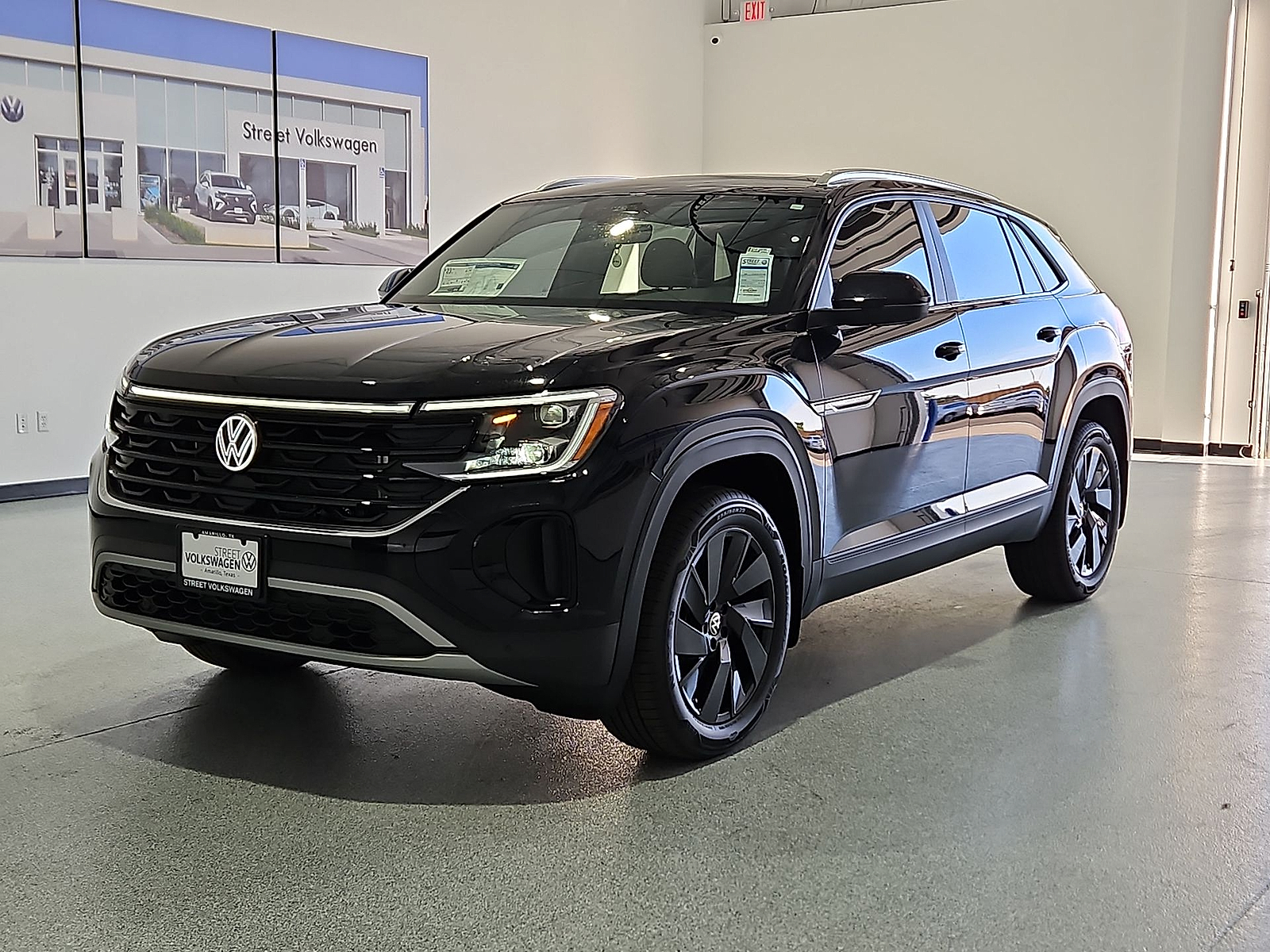 2026 Volkswagen Atlas Cross Sport SE with Technology Deep Black Pearl at Street VW of Amarillo
