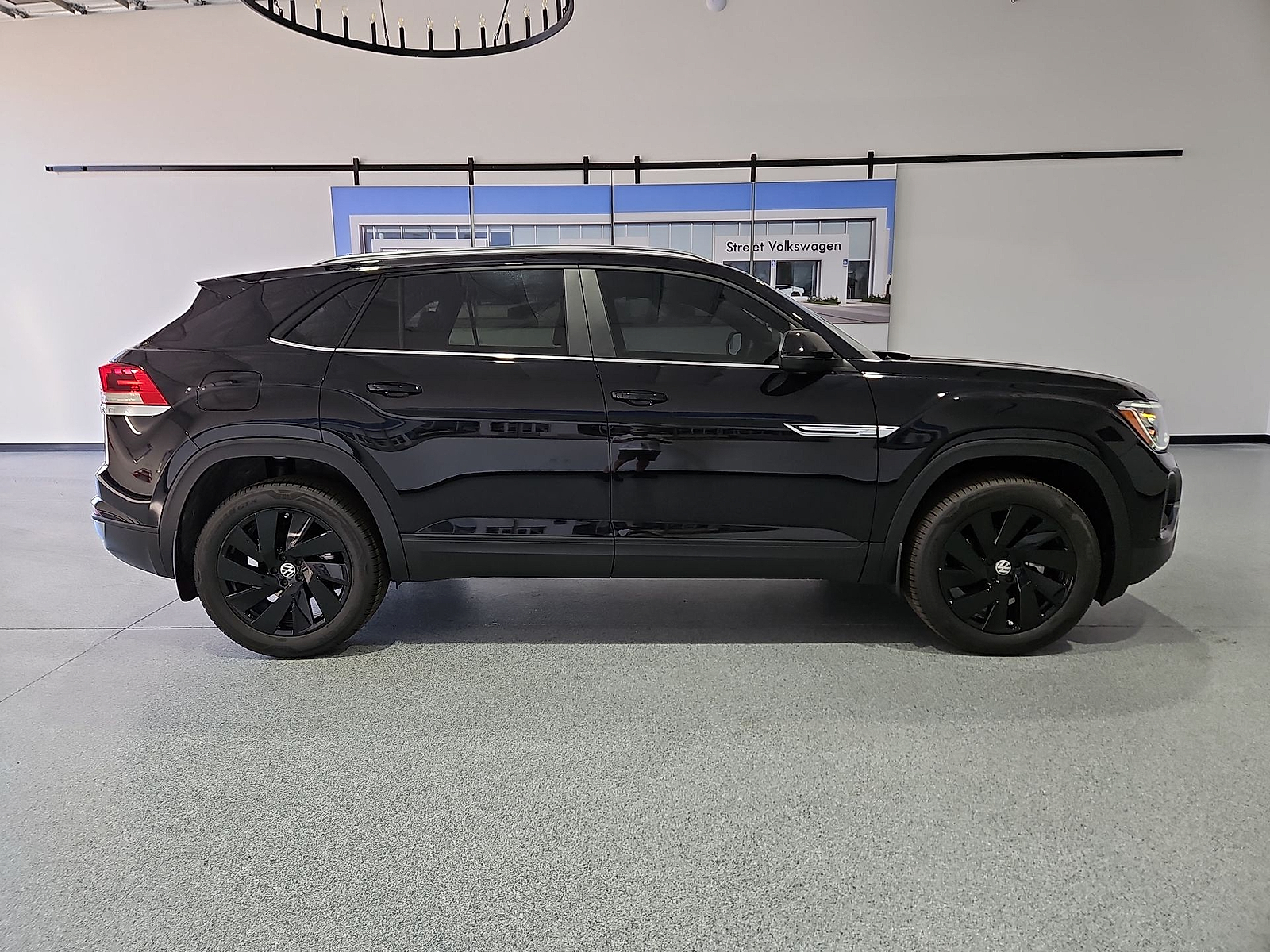 2026 Volkswagen Atlas Cross Sport SE with Technology Deep Black Pearl at Street VW of Amarillo