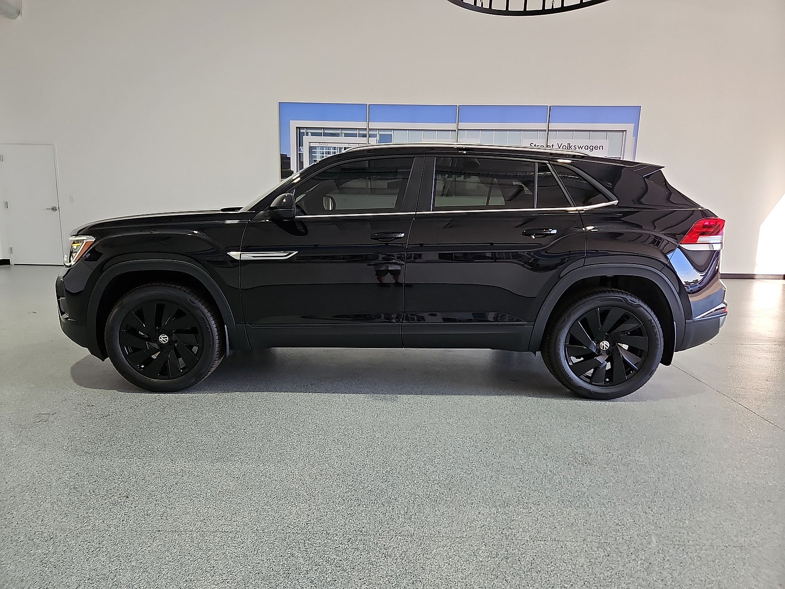 2026 Volkswagen Atlas Cross Sport SE with Technology Deep Black Pearl at Street VW of Amarillo