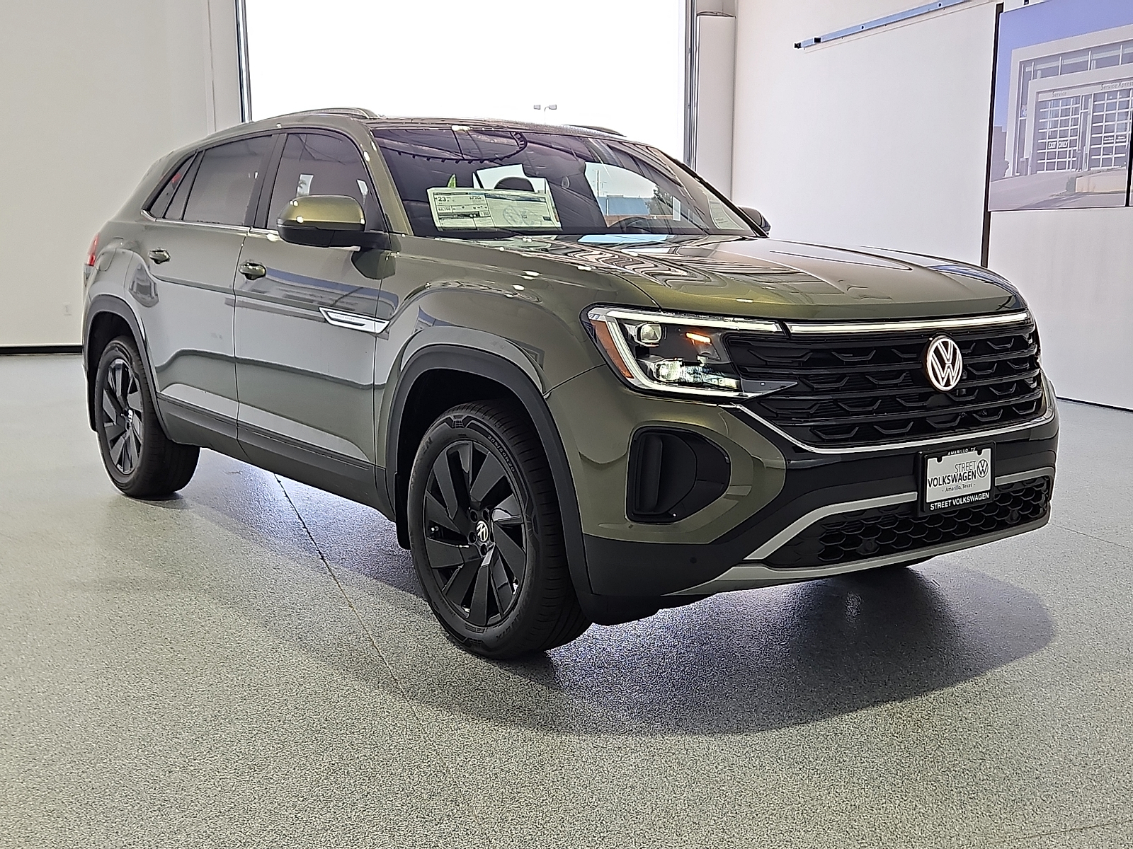 2026 Volkswagen Atlas Cross Sport SE with Technology Avocado Green Pearl at Street VW of Amarillo