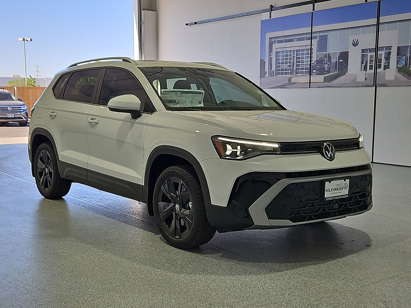 2026 Volkswagen Taos SE Pure White at Street VW of Amarillo