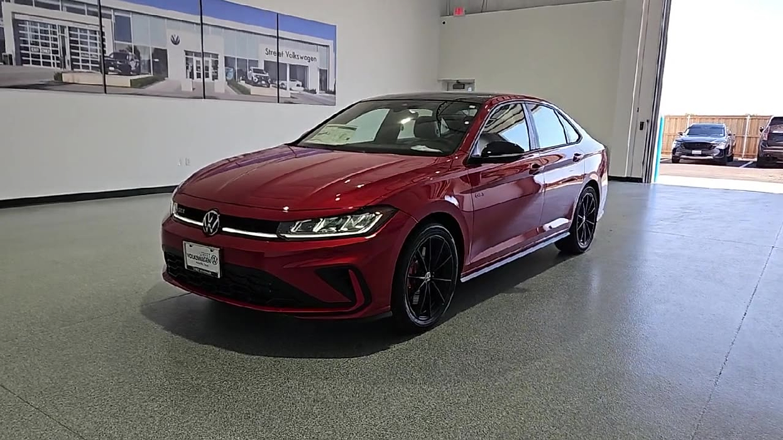 2026 Volkswagen Jetta GLI Autobahn Kings Red Metallic w/Deep Black Roof at Street VW of Amarillo