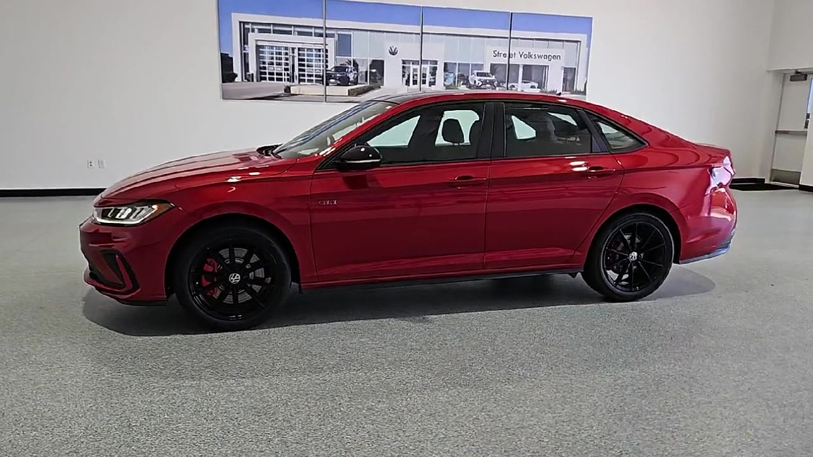 2026 Volkswagen Jetta GLI Autobahn Kings Red Metallic w/Deep Black Roof at Street VW of Amarillo