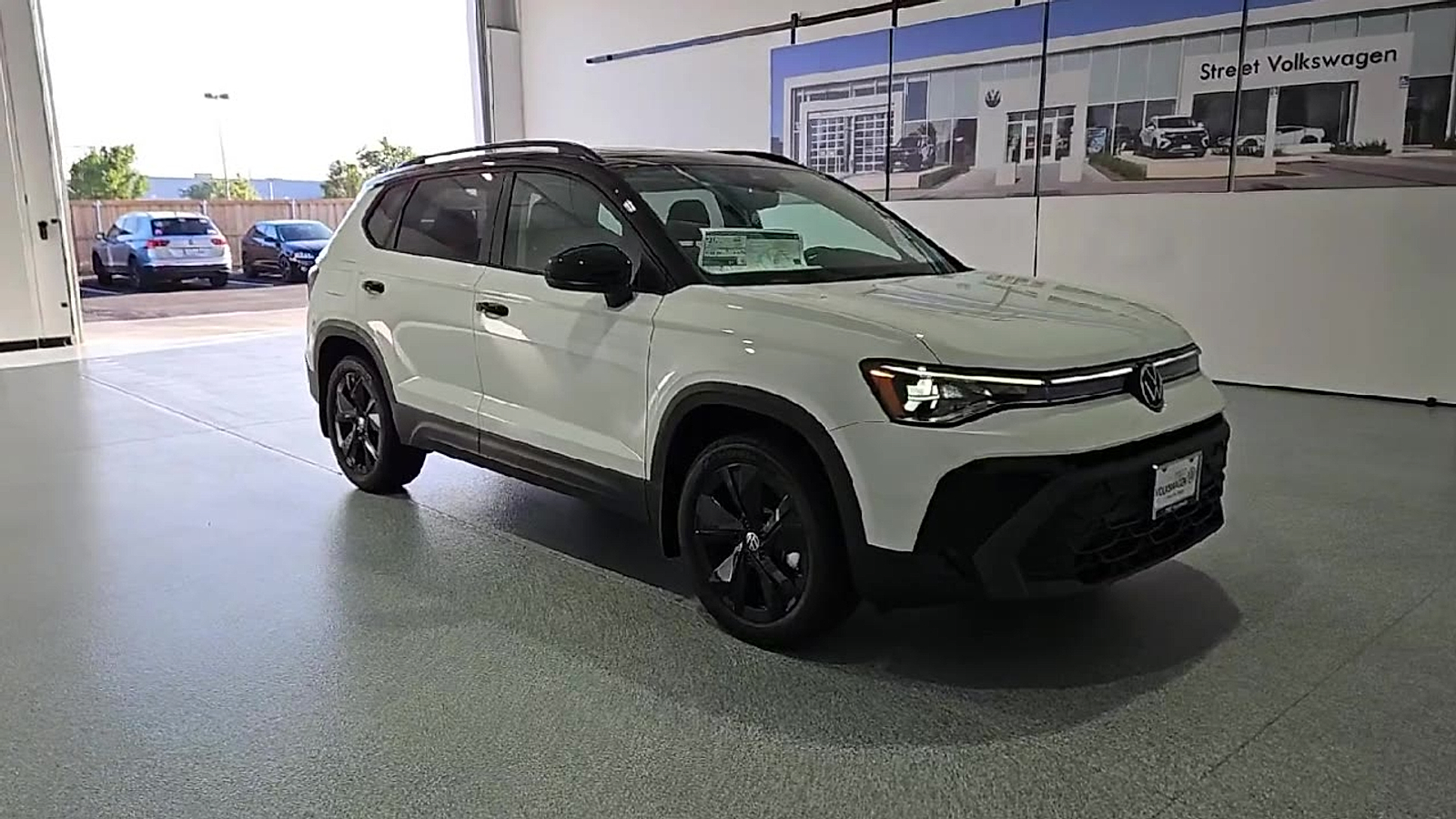 2026 Volkswagen Taos SE Black Pure White w/Deep Blk Rf at Street VW of Amarillo