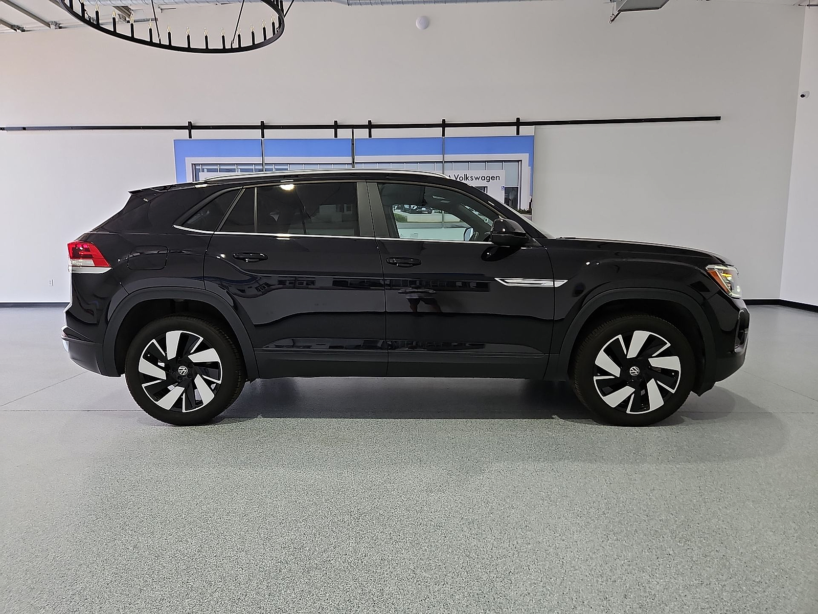 2024 Volkswagen Atlas Cross Sport 2.0T SE w/Technology Deep Black Pearl at Street VW of Amarillo