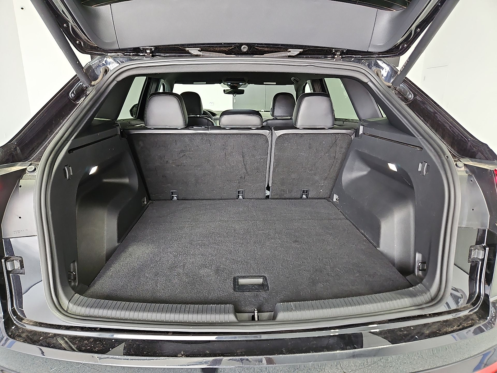 2024 Volkswagen Atlas Cross Sport 2.0T SE w/Technology Deep Black Pearl at Street VW of Amarillo