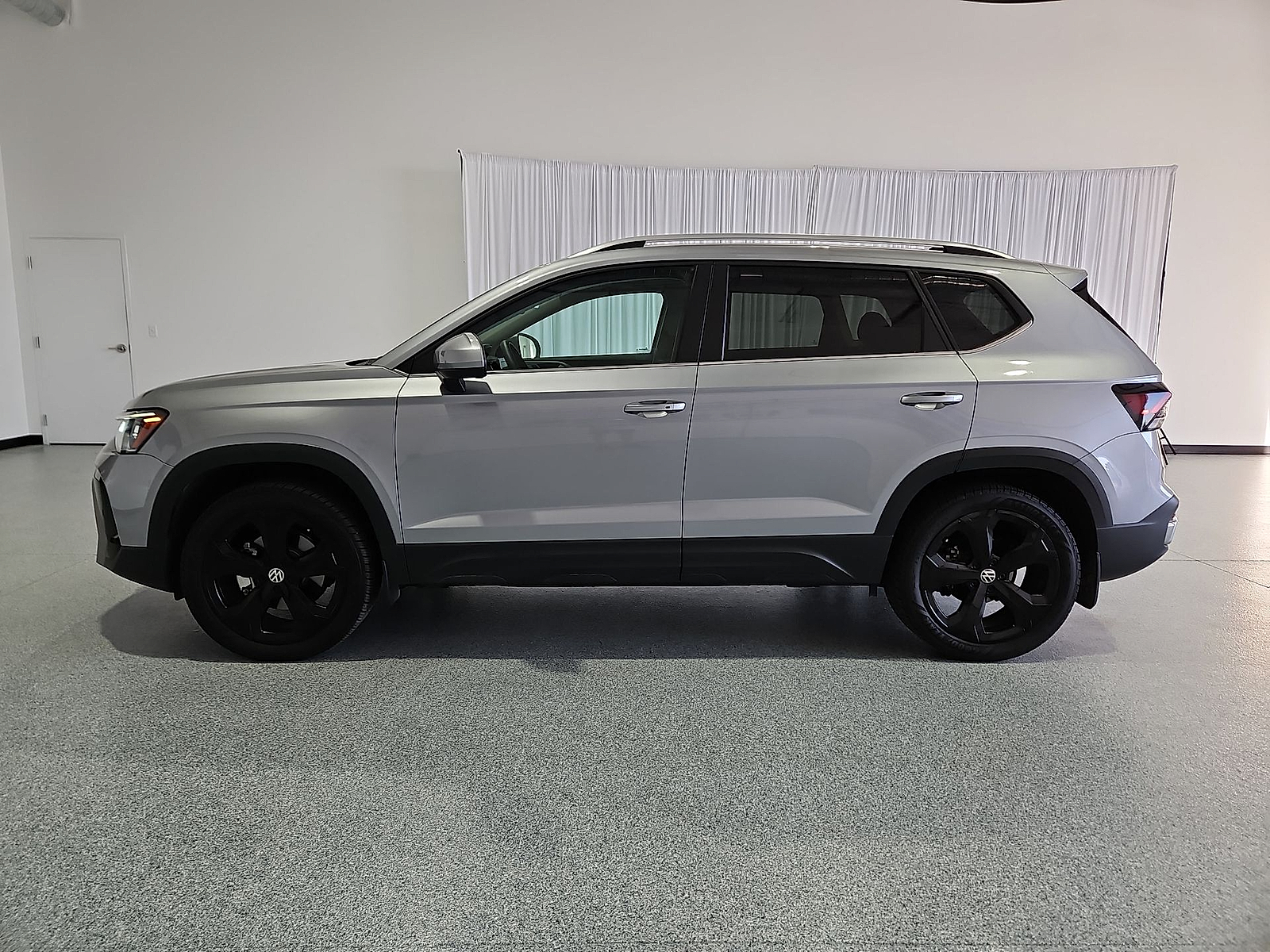 2025 Volkswagen Taos 1.5T SEL Silver Metallic at Street VW of Amarillo