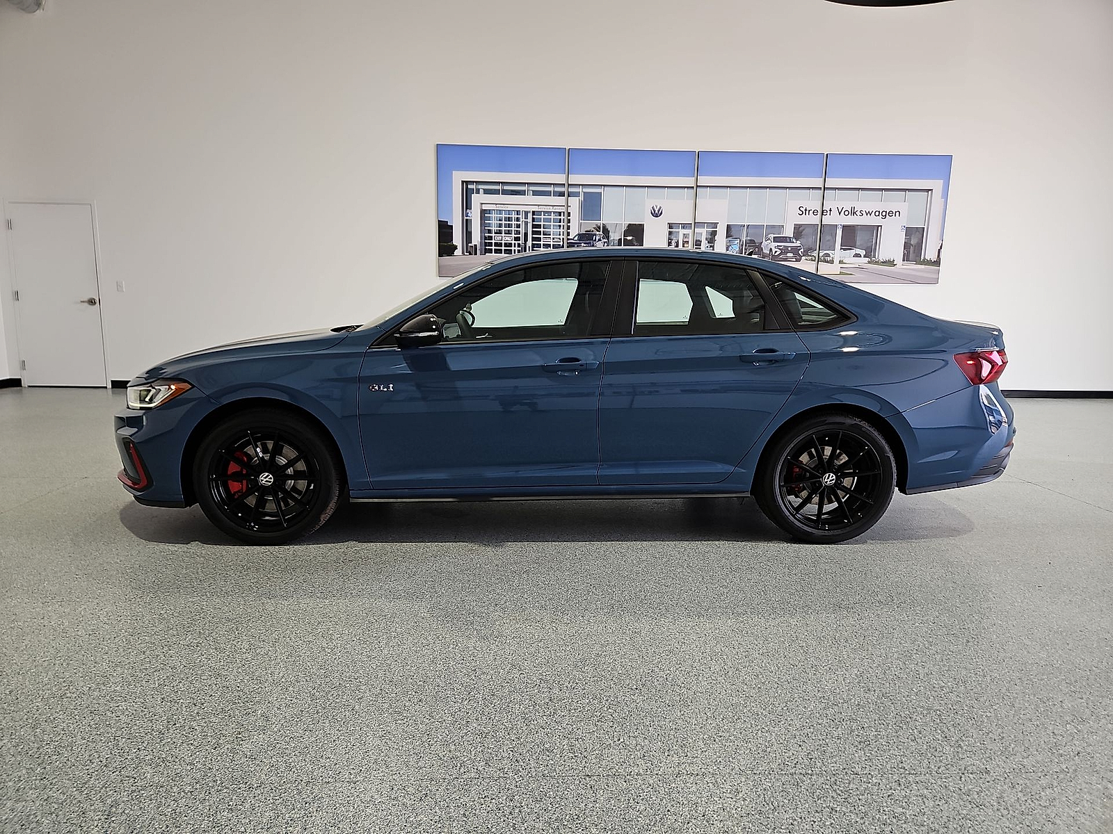 2026 Volkswagen Jetta GLI Autobahn Monterey Blue Pearl w/Deep Black Roof at Street VW of Amarillo