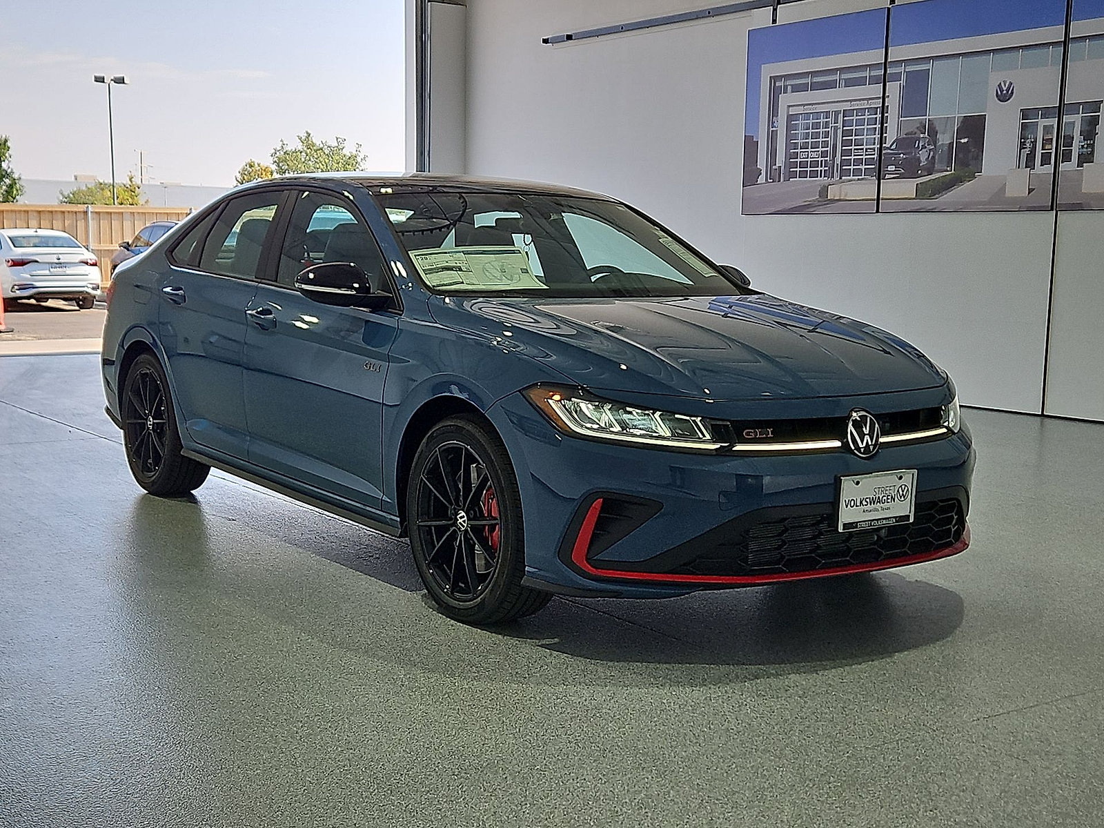 2026 Volkswagen Jetta GLI Autobahn Monterey Blue Pearl w/Deep Black Roof at Street VW of Amarillo
