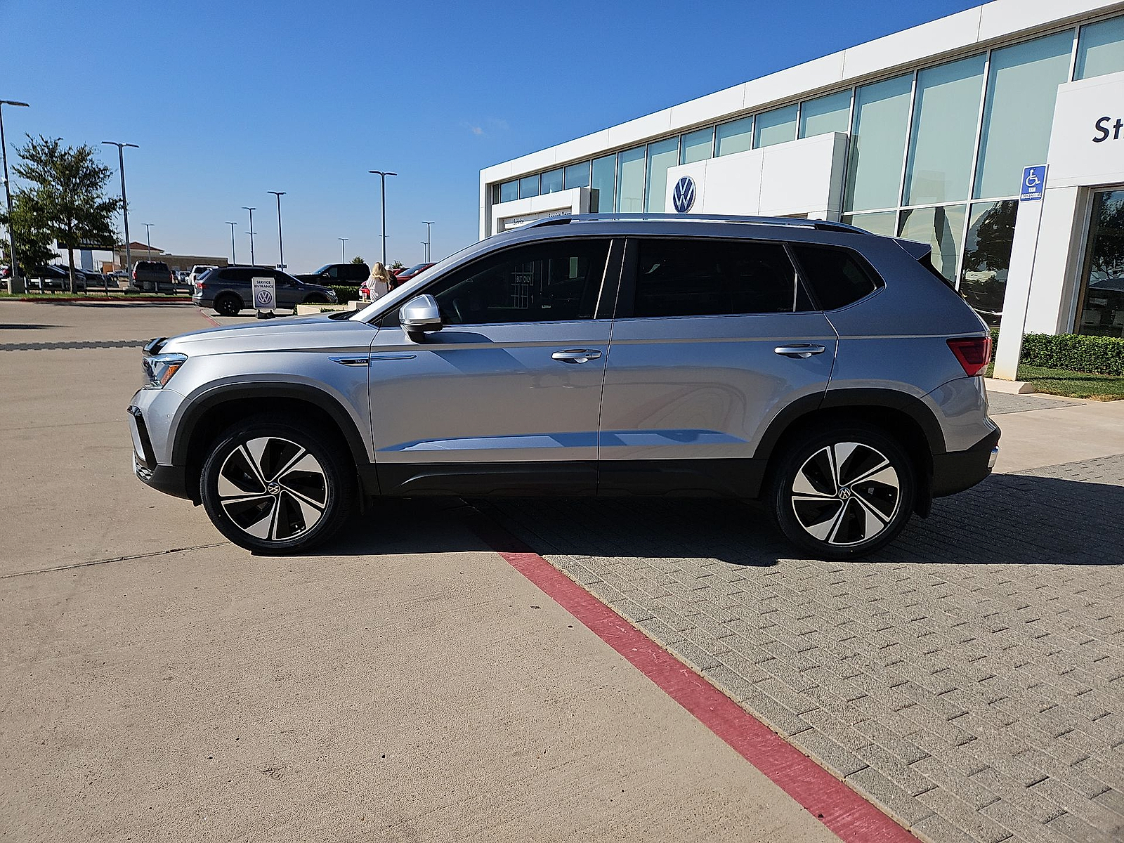 2024 Volkswagen Taos 1.5T SE Pyrite Silver Metallic at Street VW of Amarillo