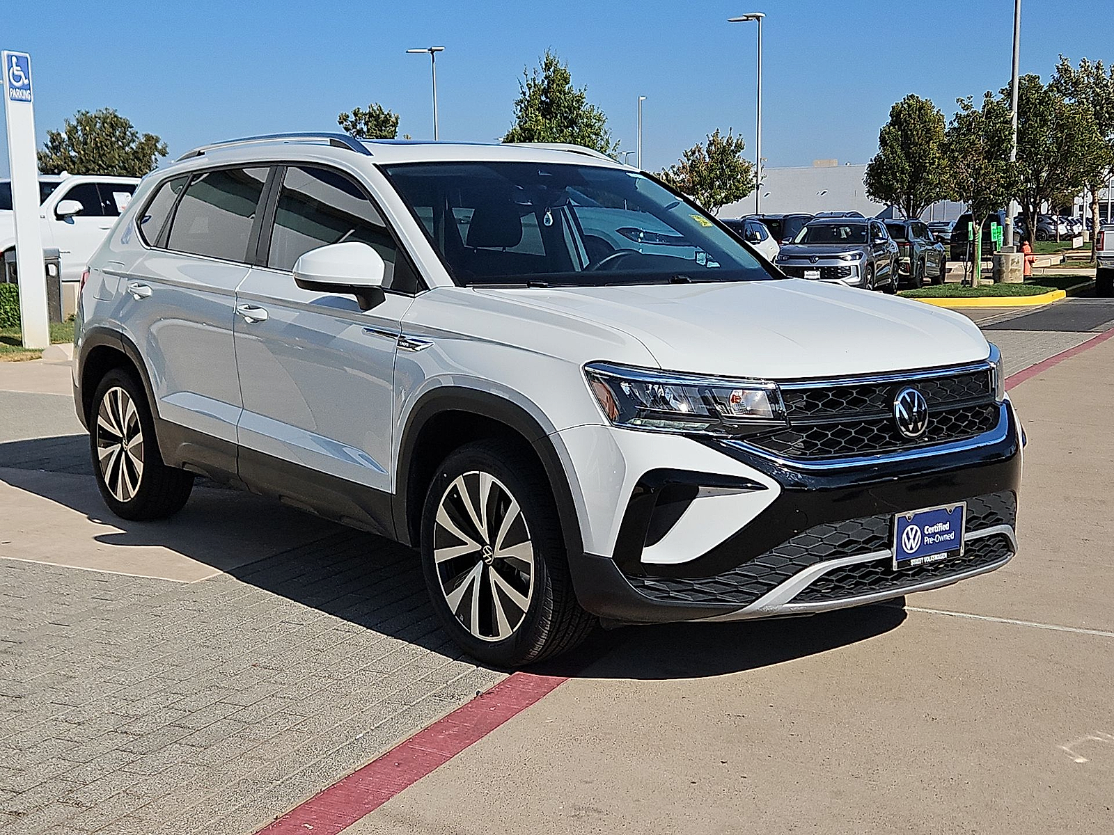 2023 Volkswagen Taos 1.5T SE Pure White at Street VW of Amarillo