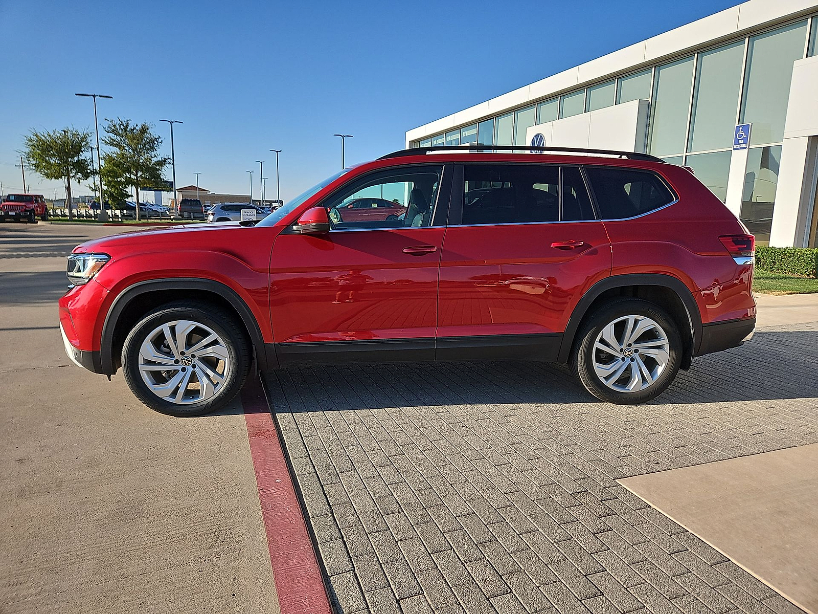 2023 Volkswagen Atlas 3.6L V6 SE w/Technology Red Metallic at Street VW of Amarillo
