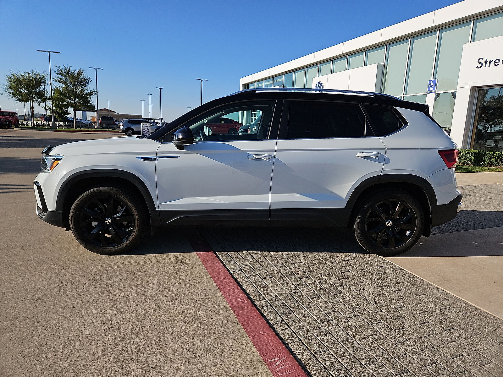 2024 Volkswagen Taos 1.5T SE Pure White at Street VW of Amarillo