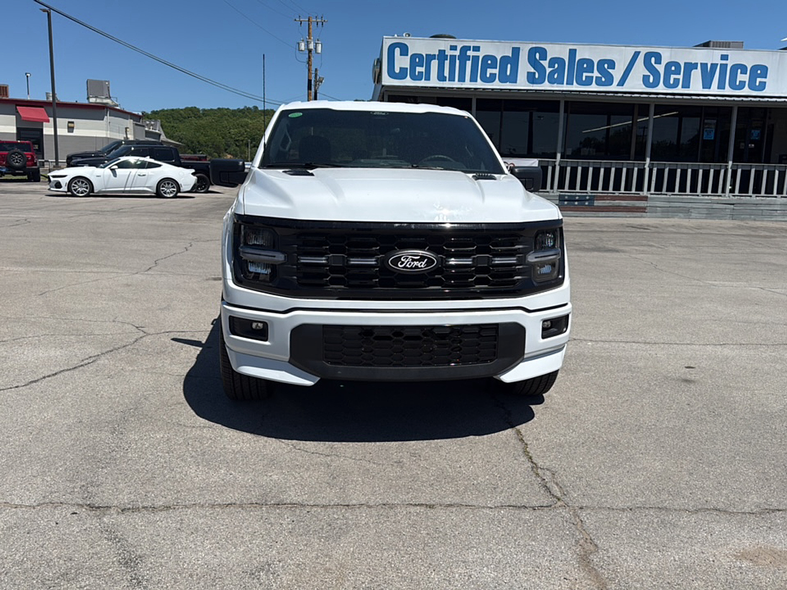 View vehicle photo 2