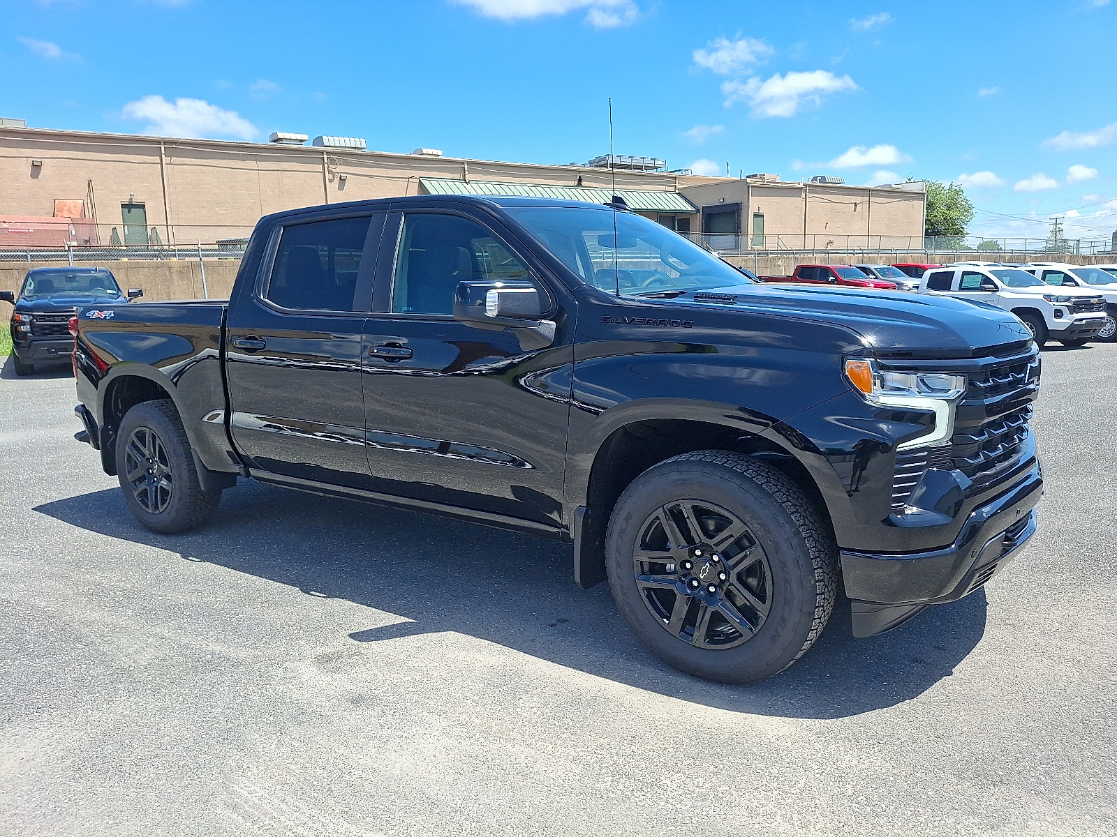 2025 Chevrolet Silverado 1500 4WD Crew Cab Short Bed RST - Black - GBA exterior view 4