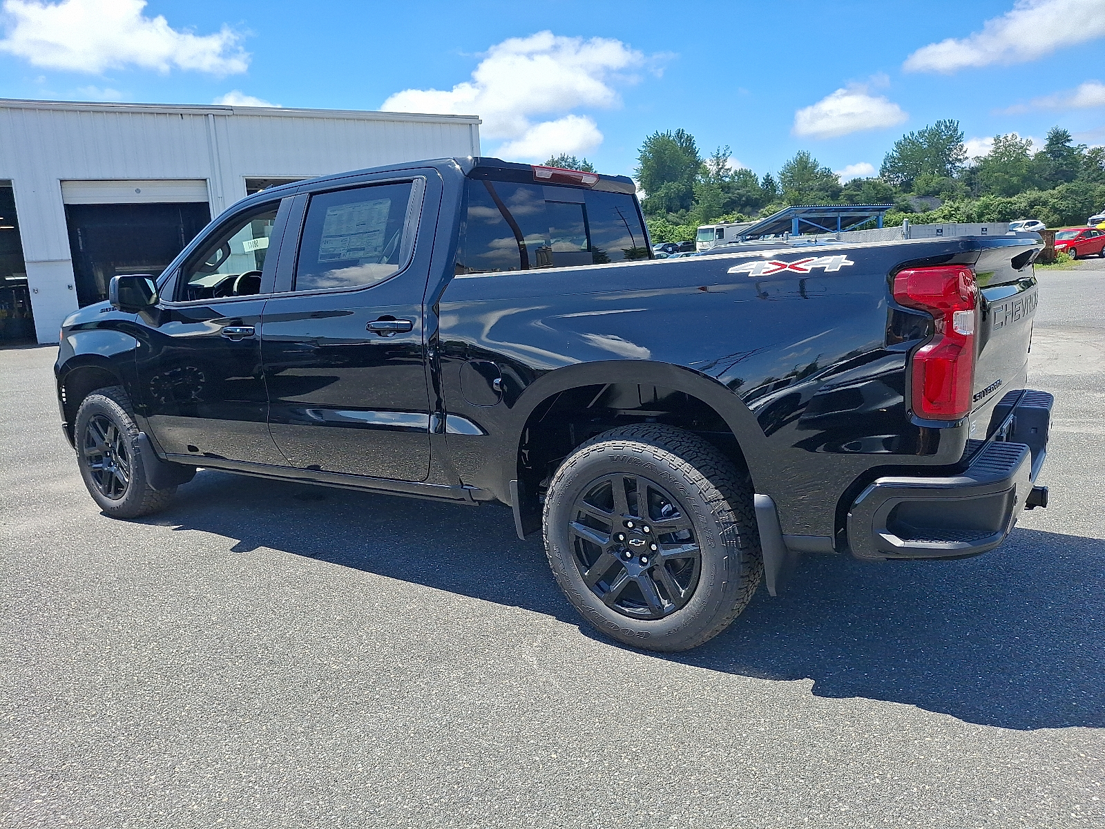 2025 Chevrolet Silverado 1500 4WD Crew Cab Short Bed RST - Black - GBA exterior view 2