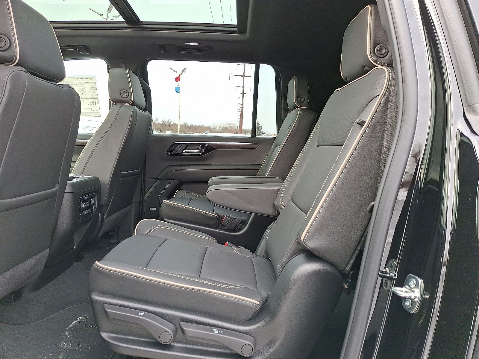 2026 Chevrolet Suburban Premier, 4WD - Black - GBA exterior view 9