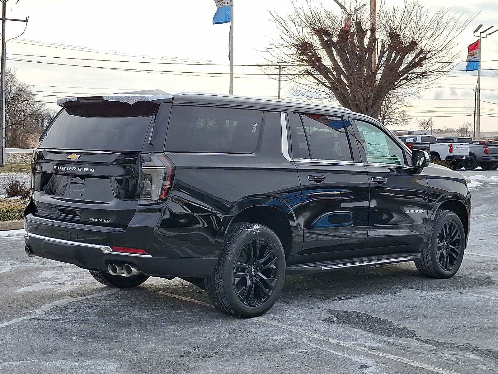 2026 Chevrolet Suburban Premier, 4WD - Black - GBA exterior view 6