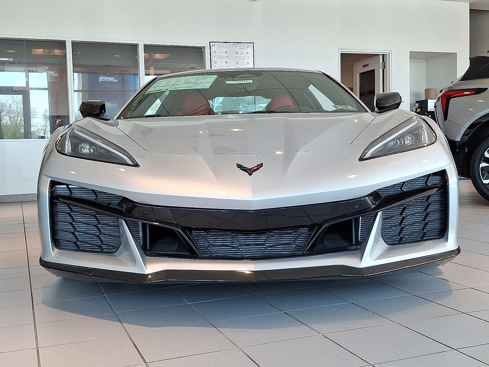 2026 Chevrolet Corvette Z06 Coupe, 2LZ, RWD - Blade Silver Metallic - GKA exterior view 6