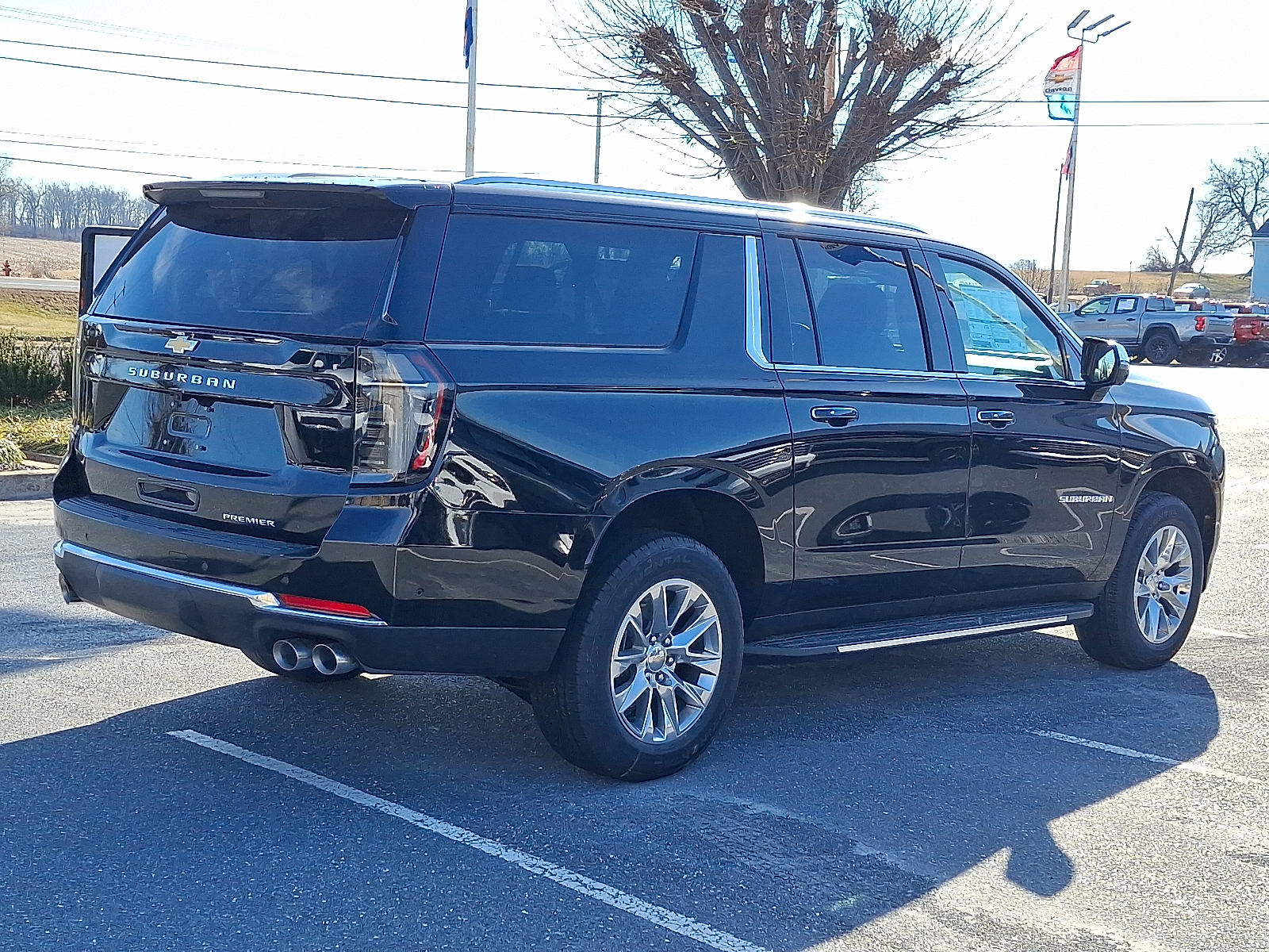 2026 Chevrolet Suburban Premier, 4WD - Black - GBA exterior view 8