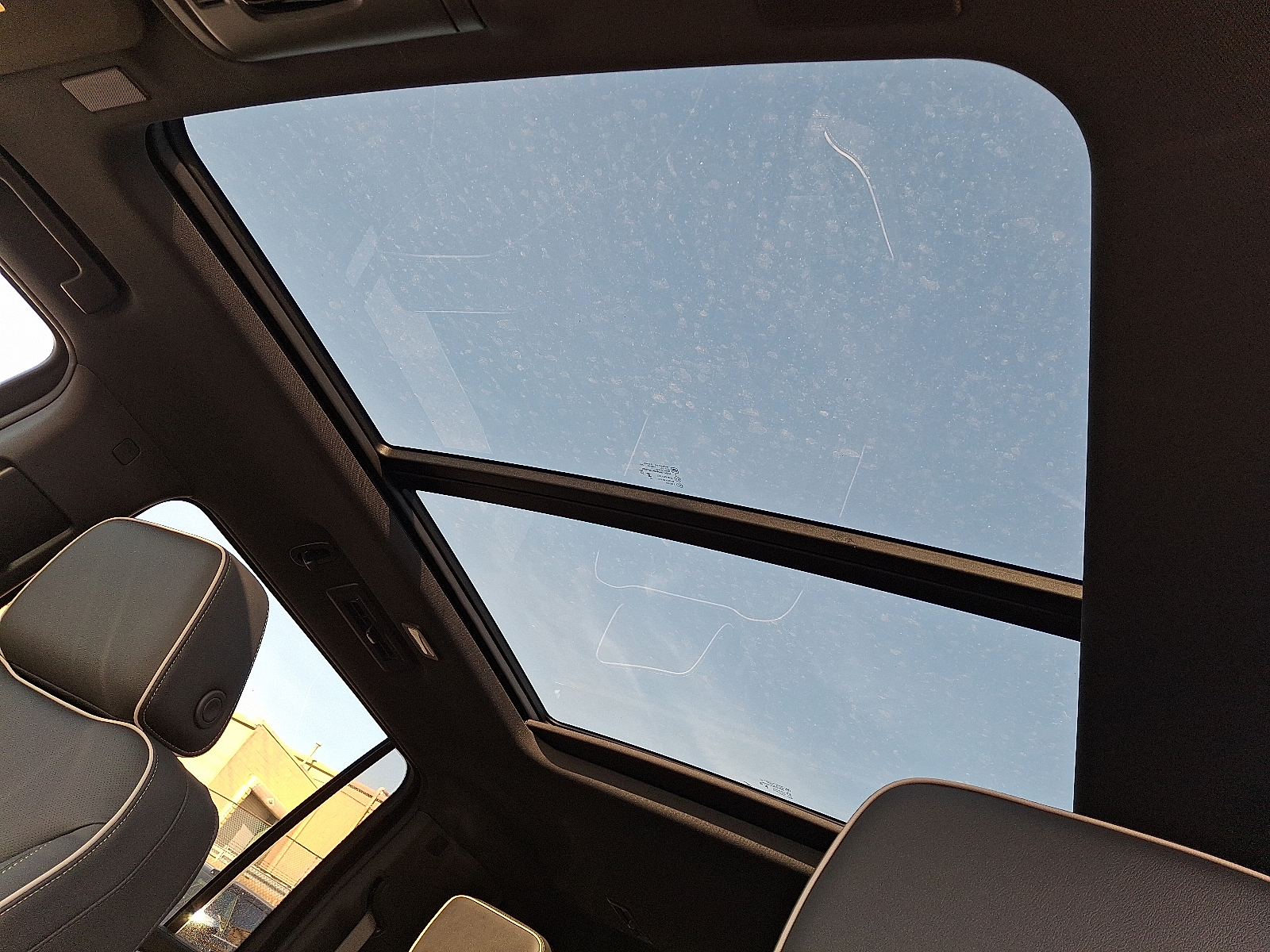 2026 Chevrolet Suburban Premier, 4WD - Black - GBA exterior view 2