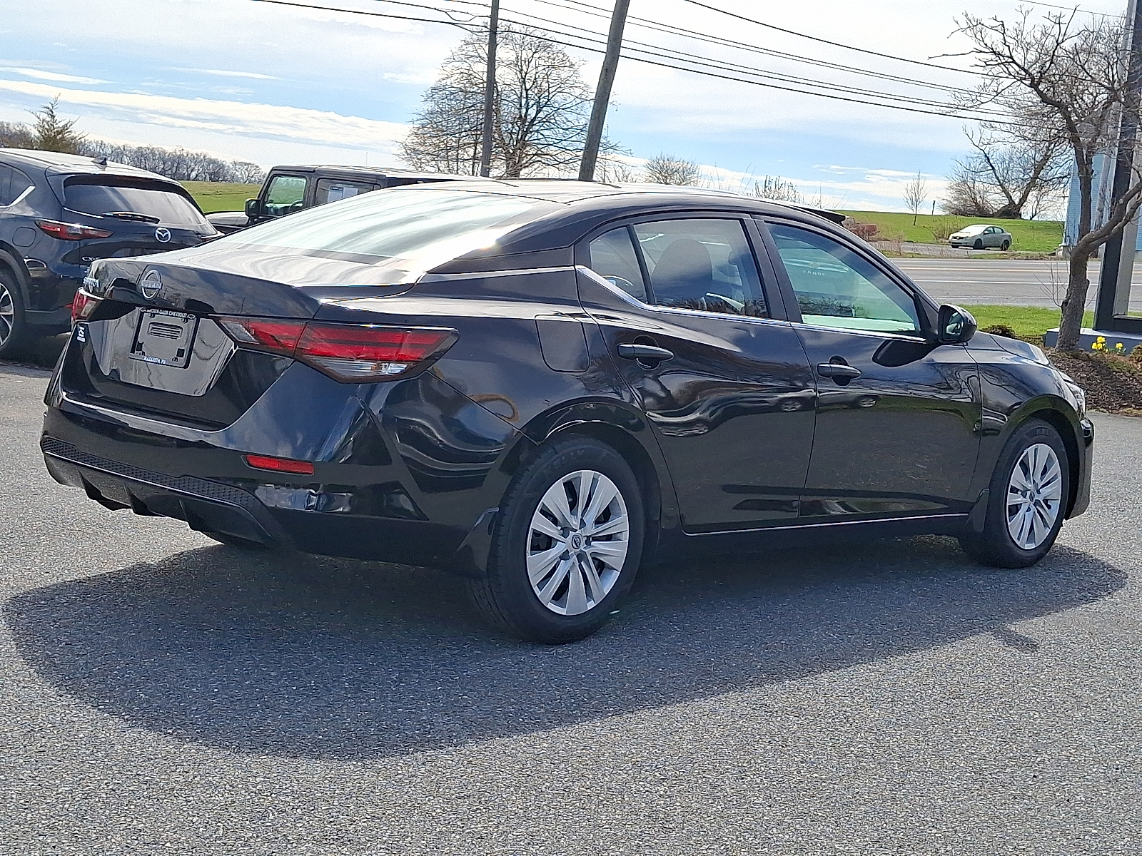 2024 Nissan Sentra S Xtronic CVT - Super Black - KH3 exterior view 6