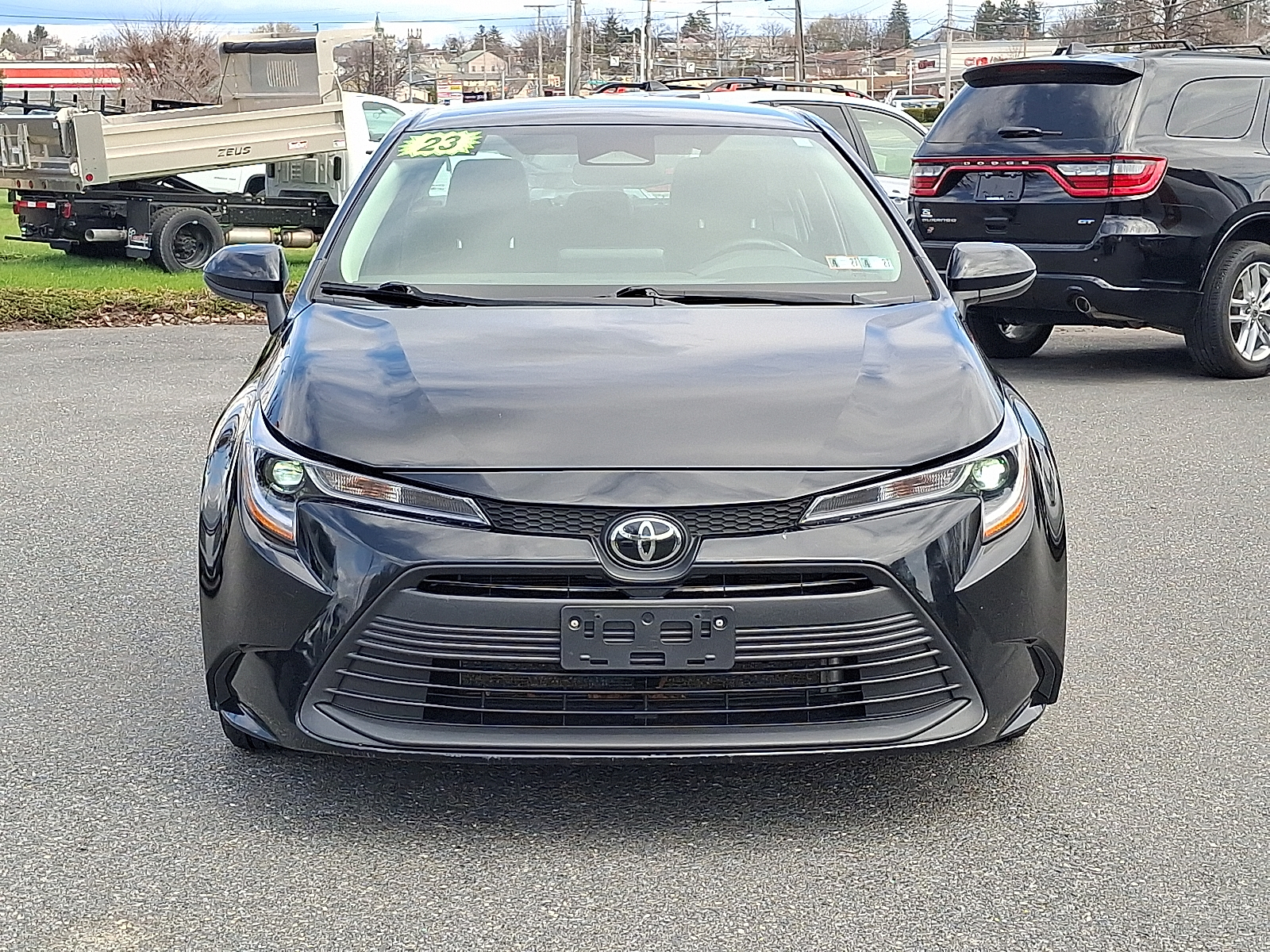 2023 Toyota Corolla LE - Midnight Black Metallic - 218 exterior view 2