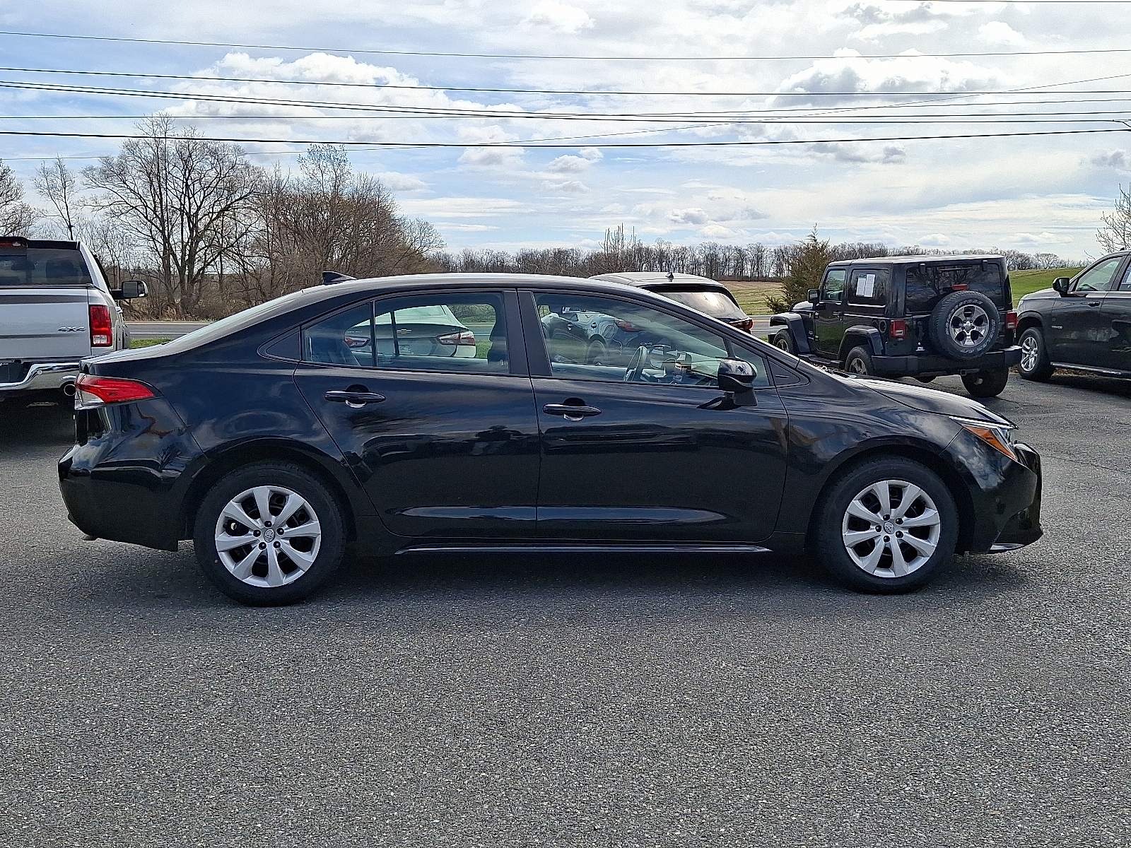 2023 Toyota Corolla LE - Midnight Black Metallic - 218 exterior view 7