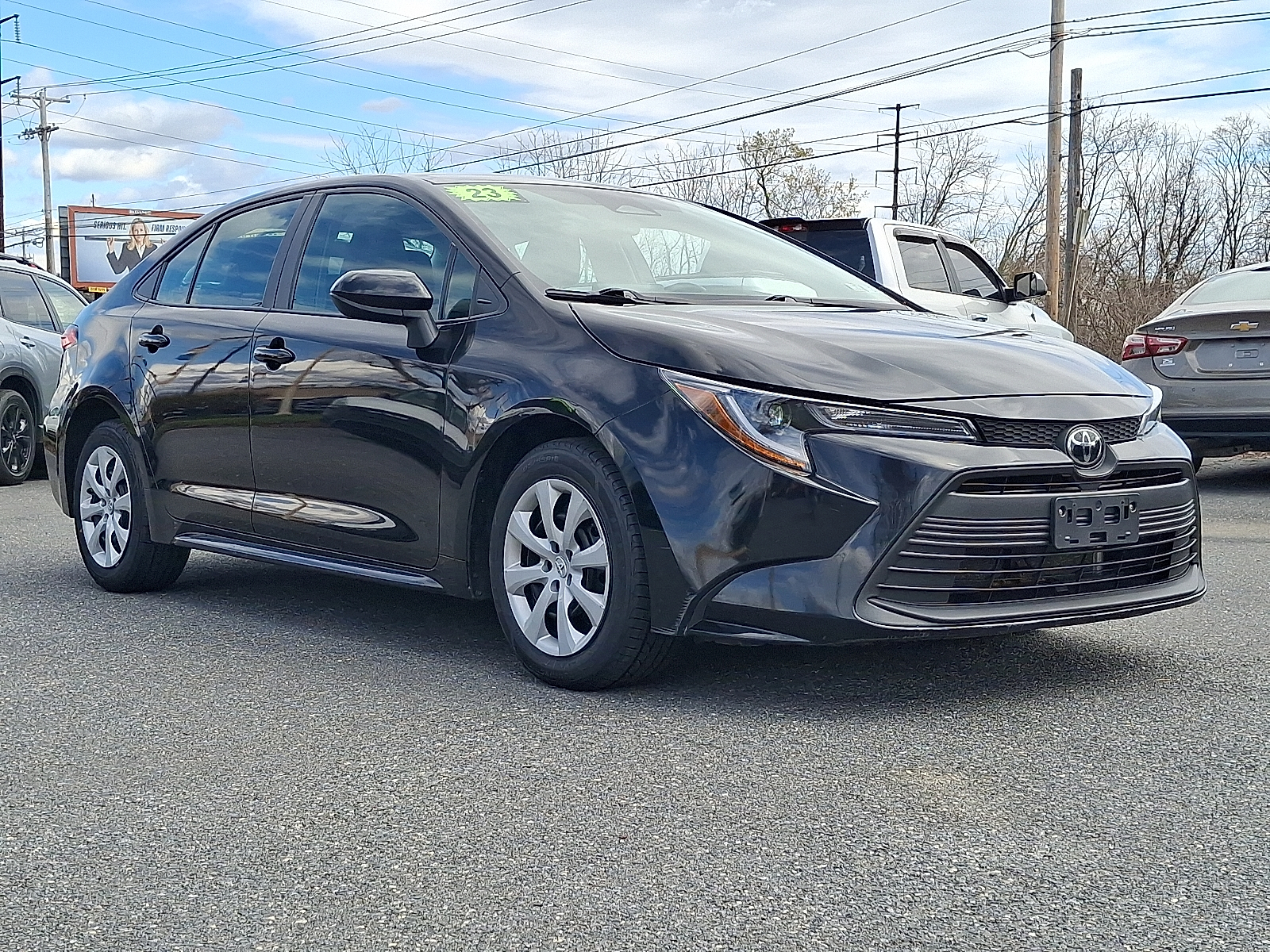 2023 Toyota Corolla LE - Midnight Black Metallic - 218 exterior view 3