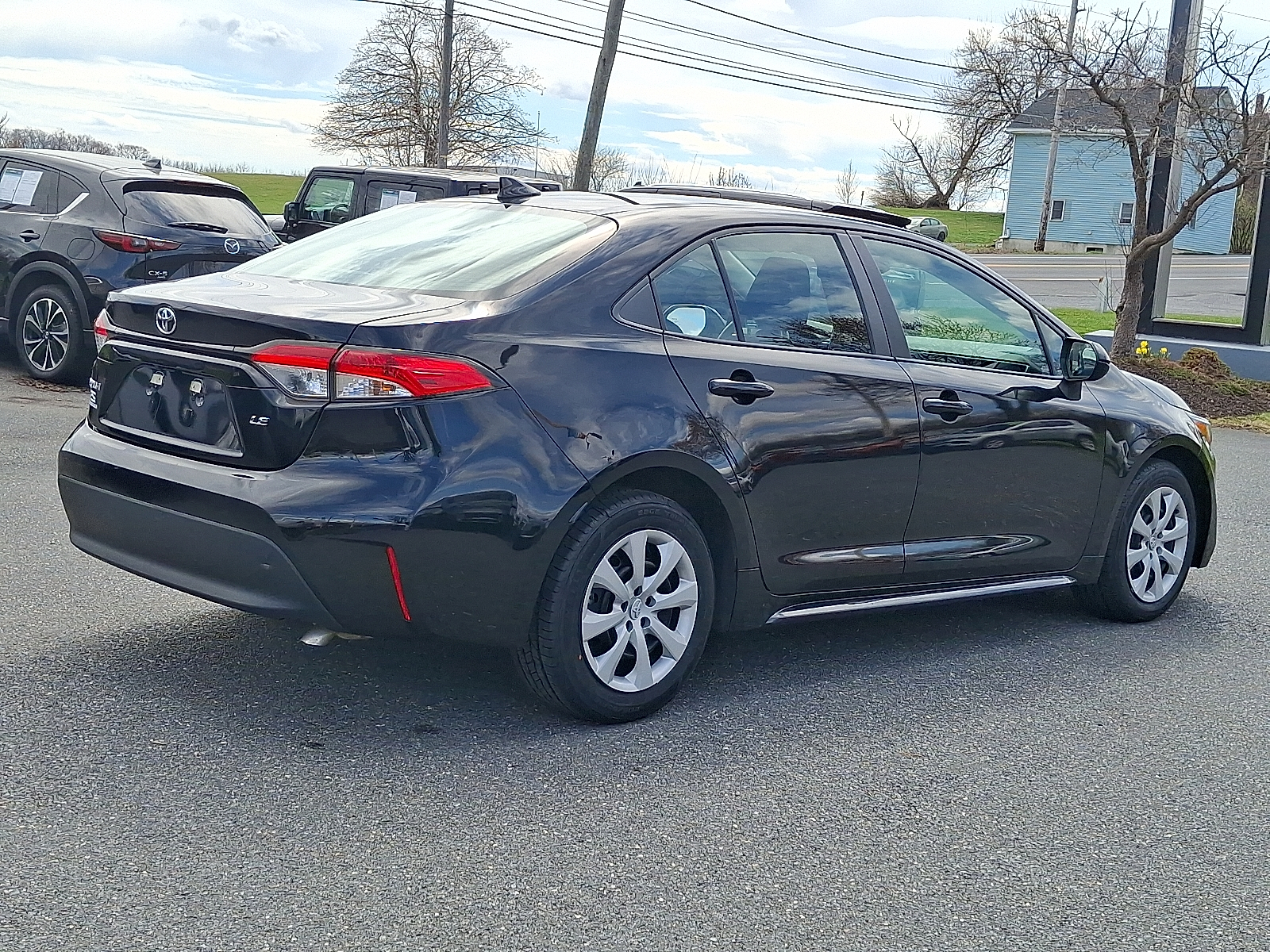 2023 Toyota Corolla LE - Midnight Black Metallic - 218 exterior view 6