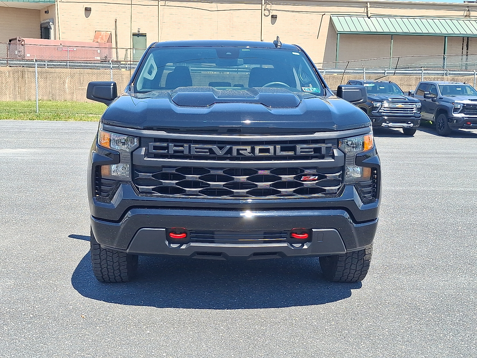 2023 Chevrolet Silverado 1500 4WD Crew Cab Short Bed Custom Trail Boss - Black - GBA exterior view 2