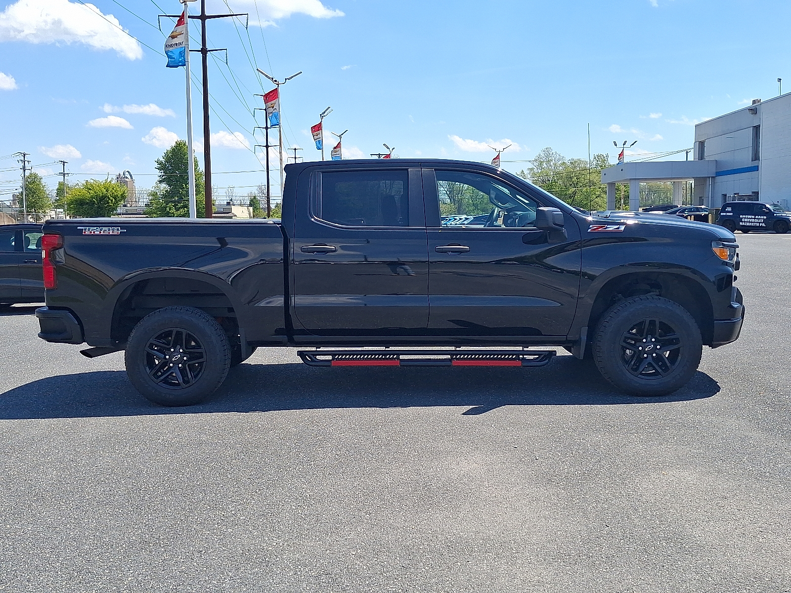 2023 Chevrolet Silverado 1500 4WD Crew Cab Short Bed Custom Trail Boss - Black - GBA exterior view 7