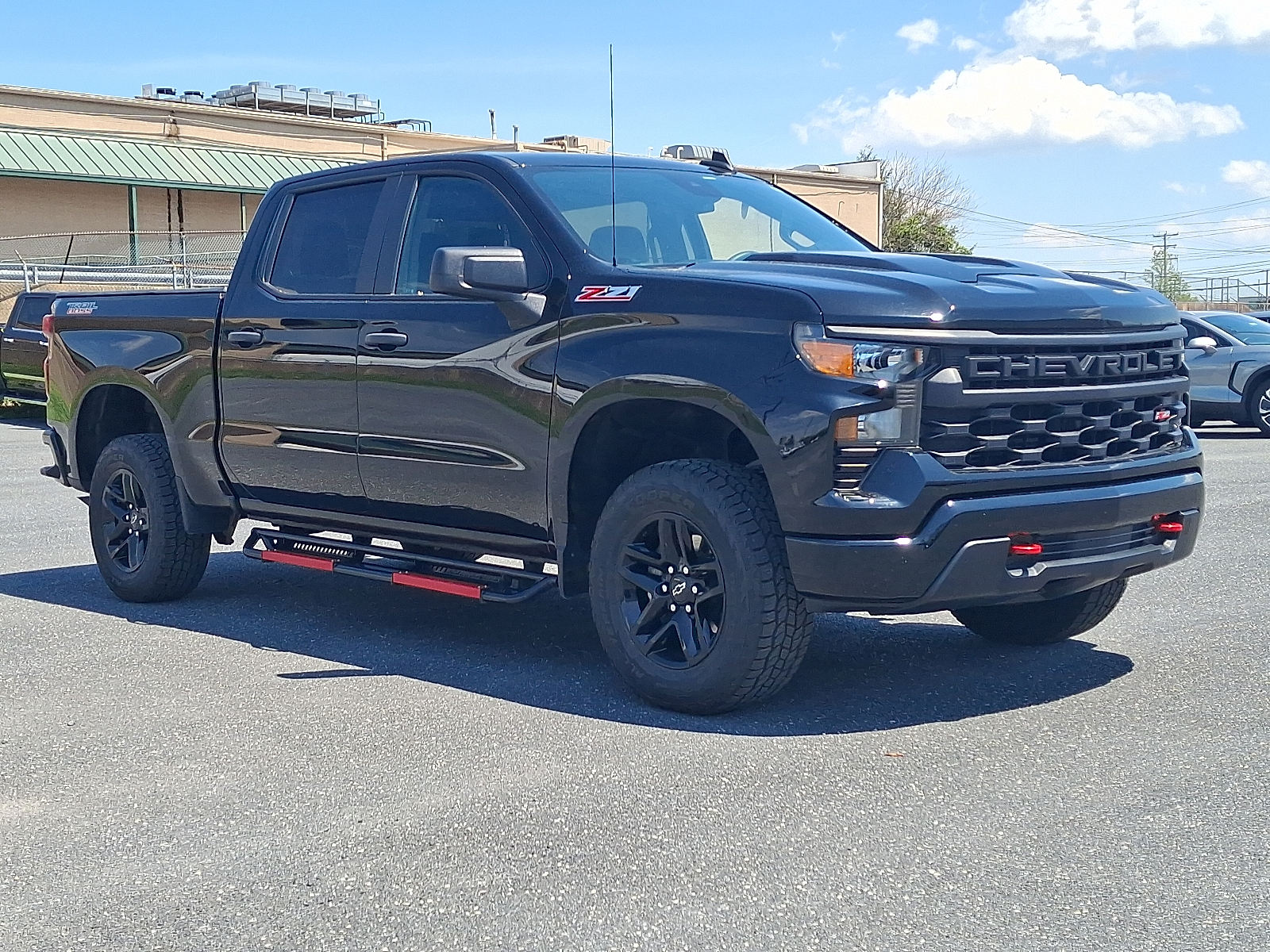 2023 Chevrolet Silverado 1500 4WD Crew Cab Short Bed Custom Trail Boss - Black - GBA exterior view 3