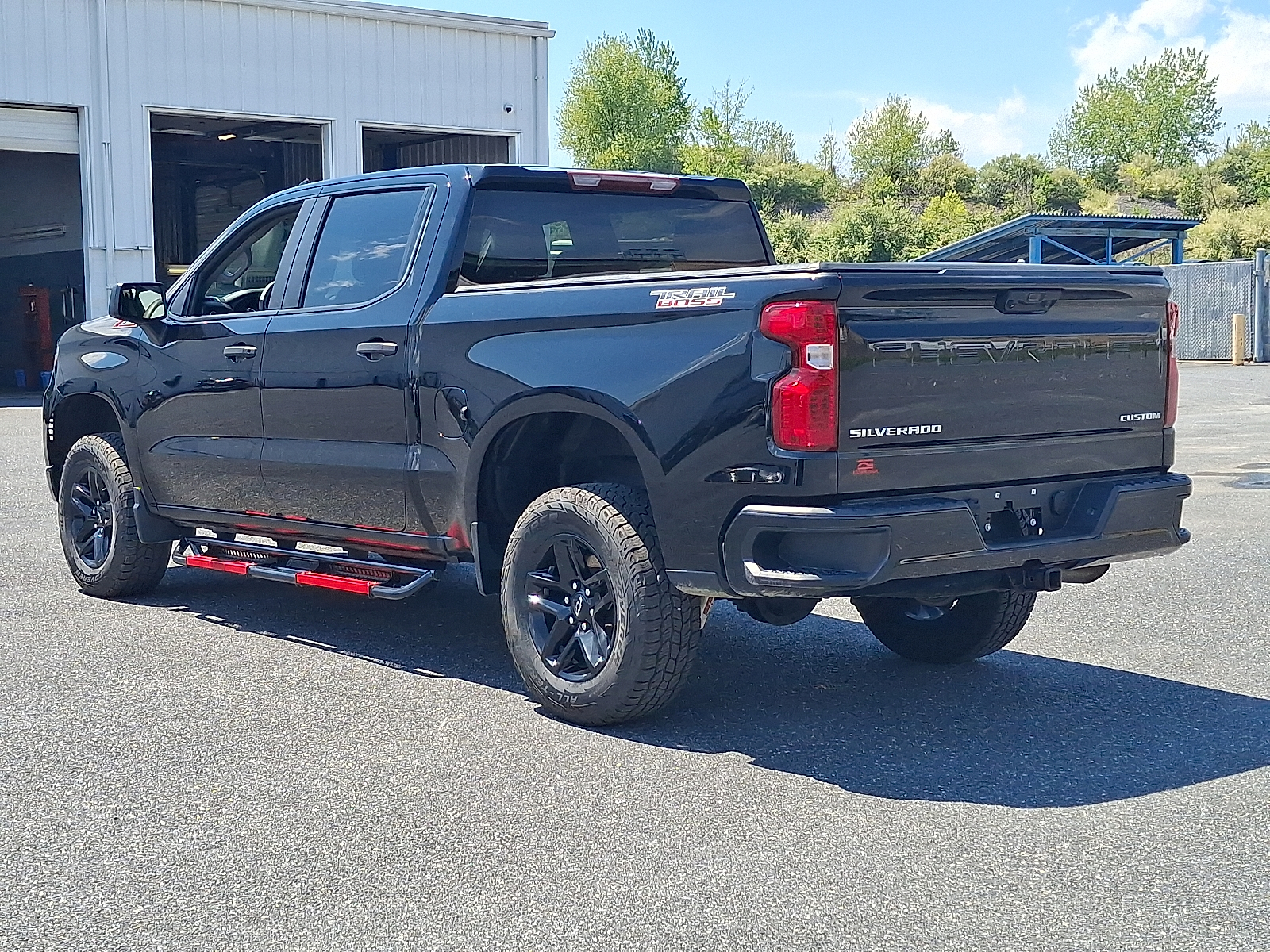 2023 Chevrolet Silverado 1500 4WD Crew Cab Short Bed Custom Trail Boss - Black - GBA exterior view 4