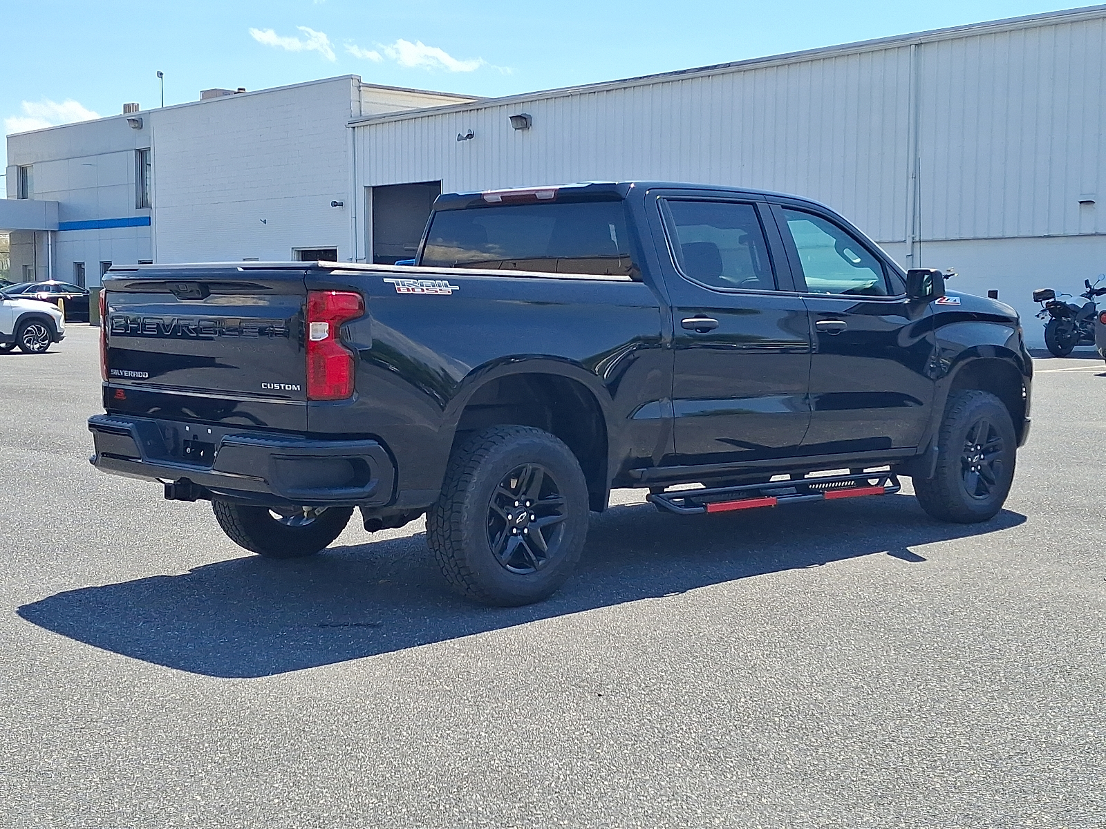 2023 Chevrolet Silverado 1500 4WD Crew Cab Short Bed Custom Trail Boss - Black - GBA exterior view 6