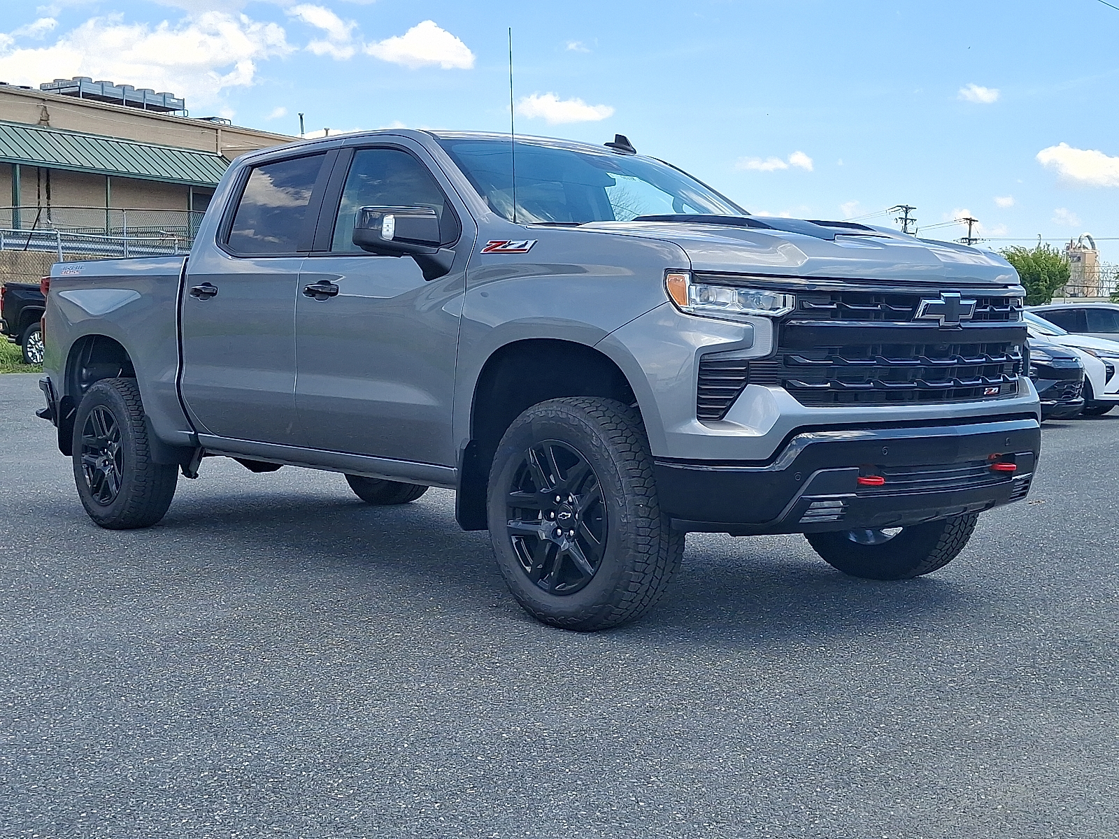 2026 Chevrolet Silverado 1500 4WD Crew Cab Short Bed LT Trail Boss - Sterling Gray Metallic - GXD exterior view 5