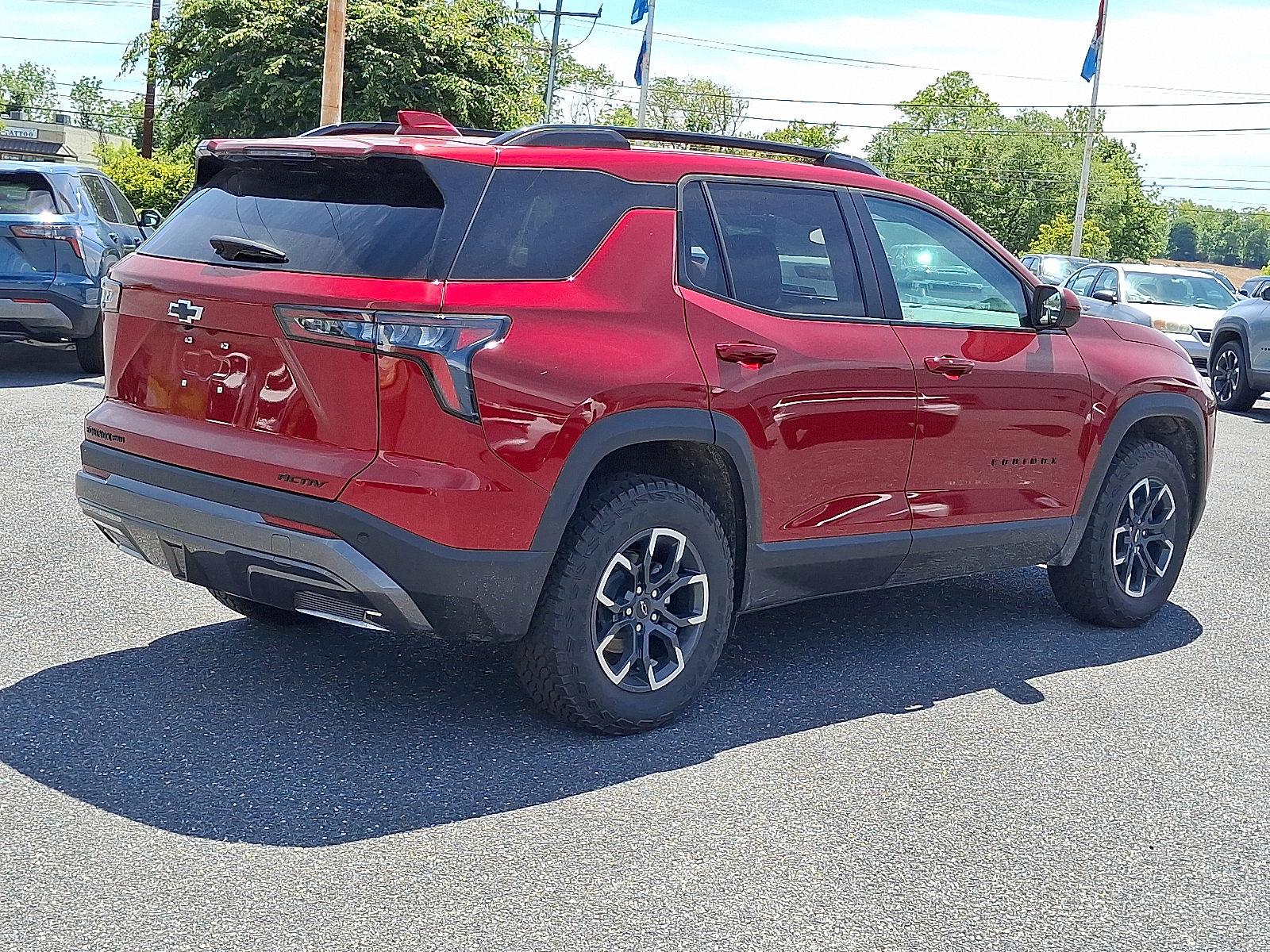 2026 Chevrolet Equinox AWD ACTIV - Radiant Red Tintcoat - GNT exterior view 6