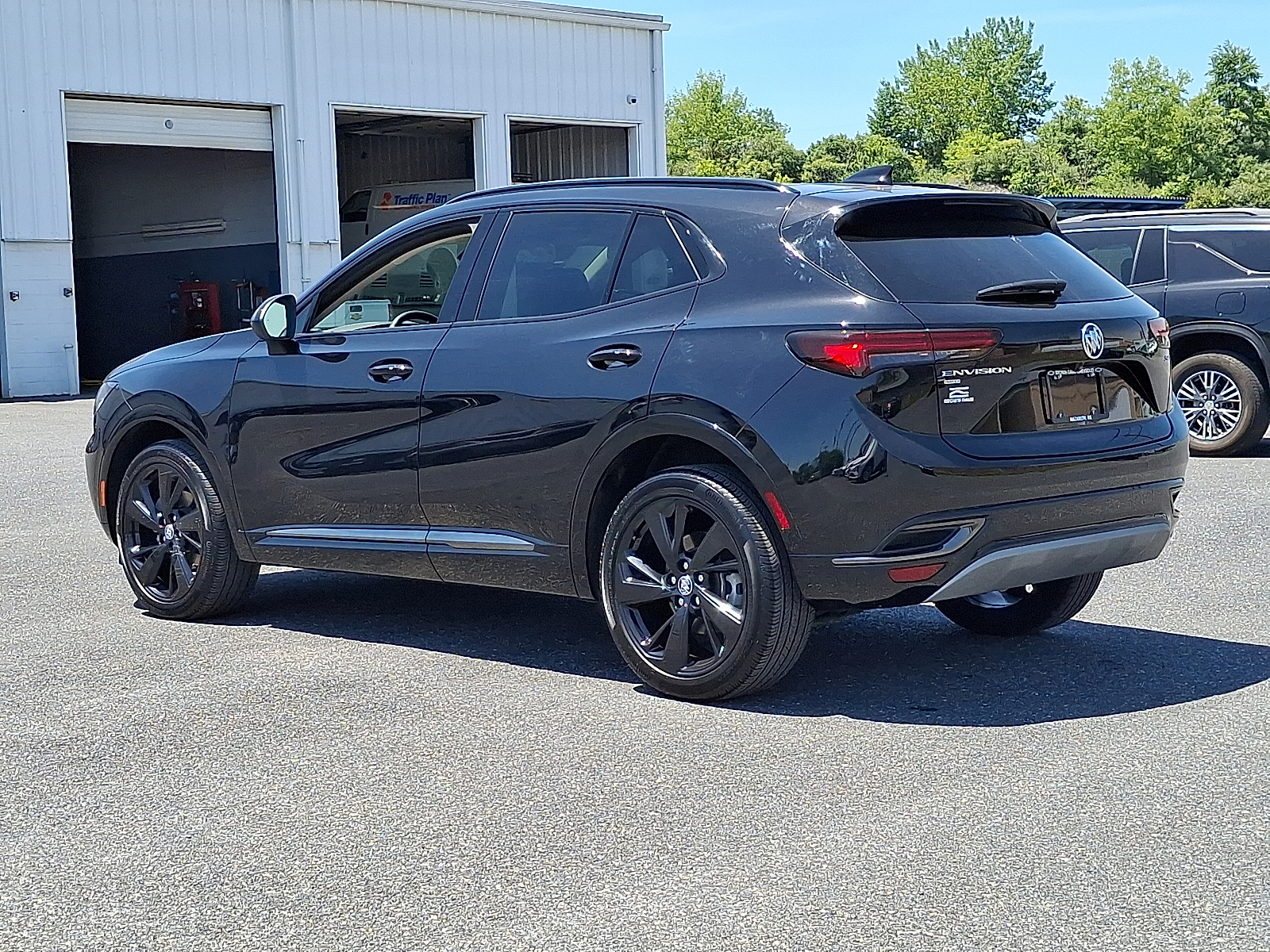 2023 Buick Envision Essence AWD - Ebony Twilight Metallic - GB8 exterior view 8