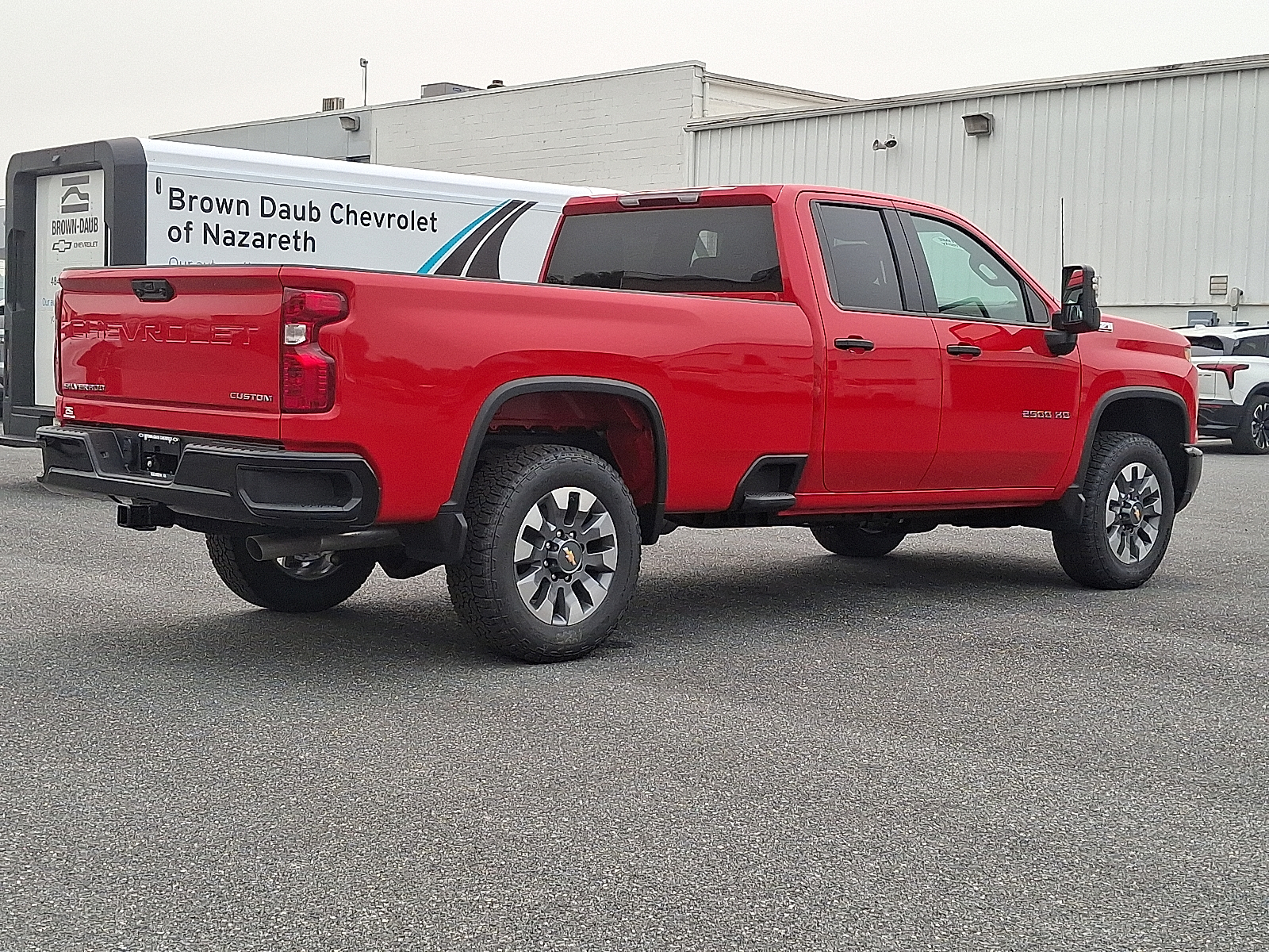 2026 Chevrolet Silverado 2500 HD Double Cab, Long Bed, Custom, 4WD - Red Hot - G7C exterior view 3