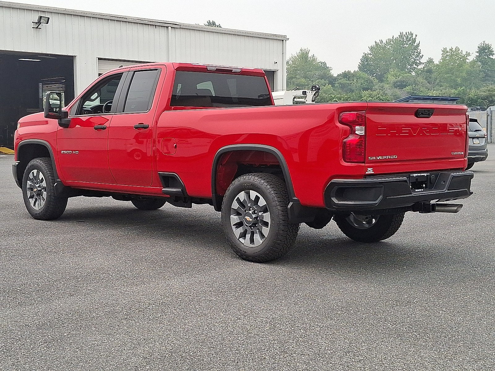 2026 Chevrolet Silverado 2500 HD Double Cab, Long Bed, Custom, 4WD - Red Hot - G7C exterior view 4