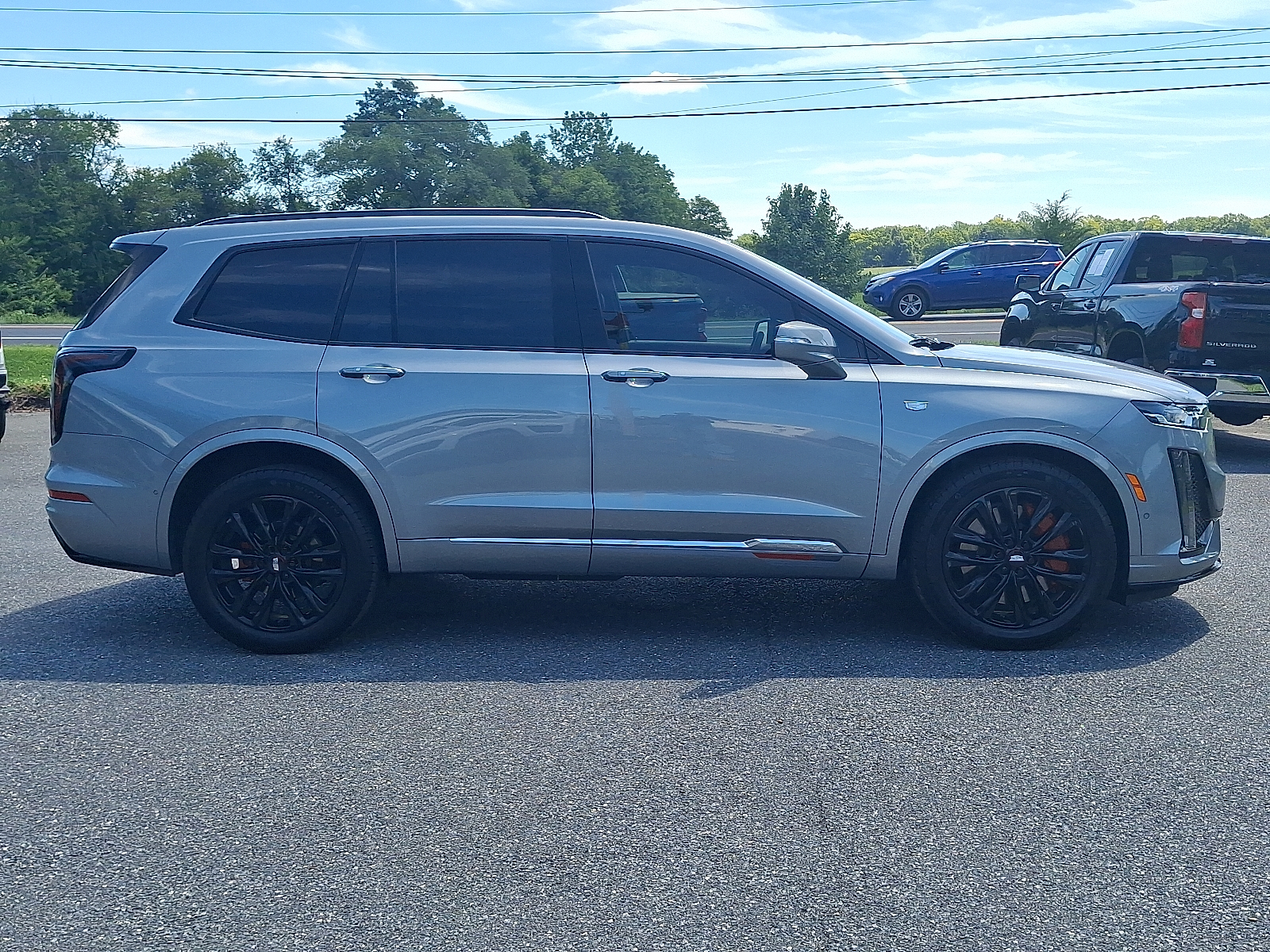 2025 Cadillac XT6 AWD Sport - Argent Silver Metallic - GXD exterior view 11